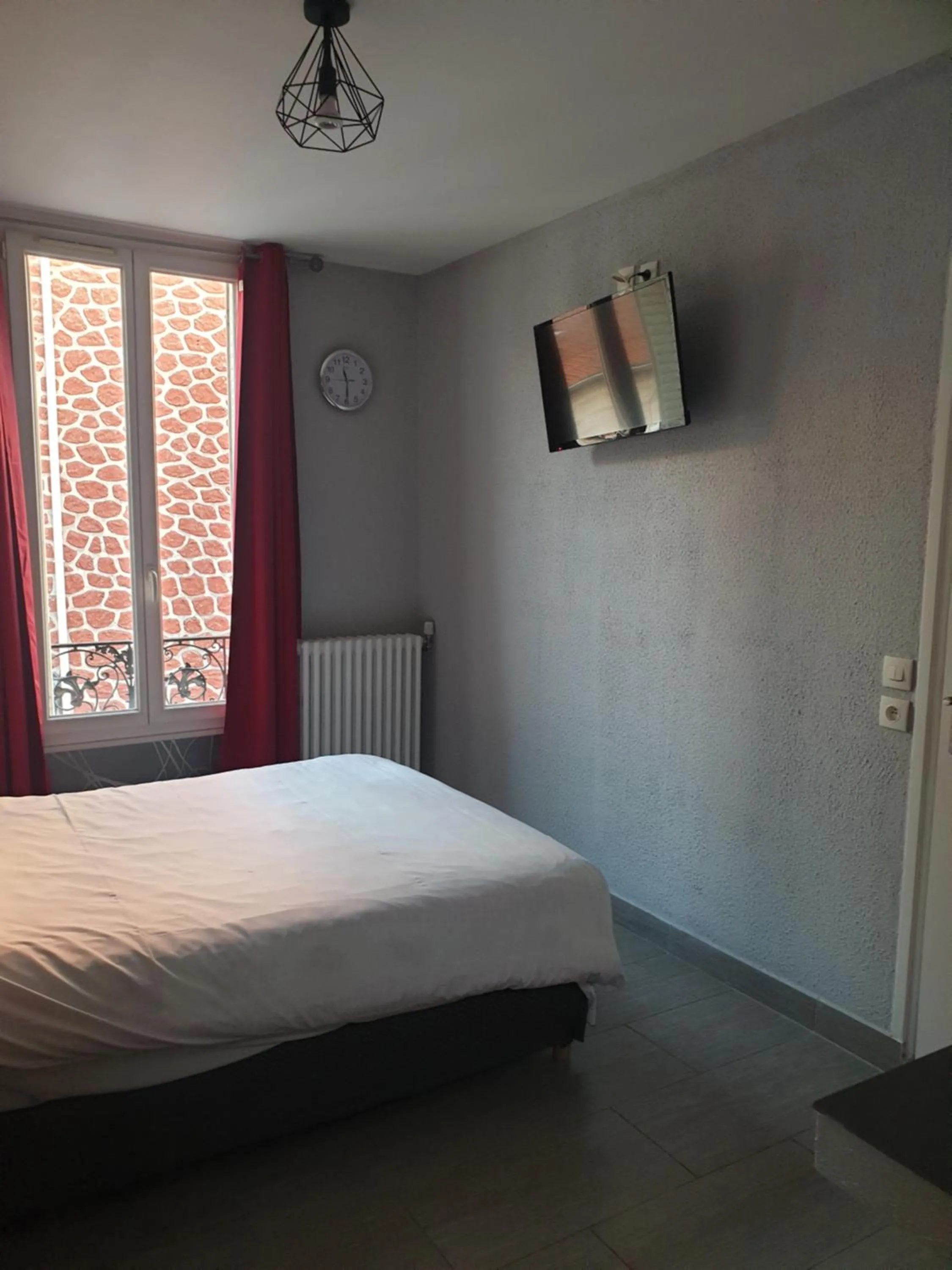 Bed in Hôtel Belfort