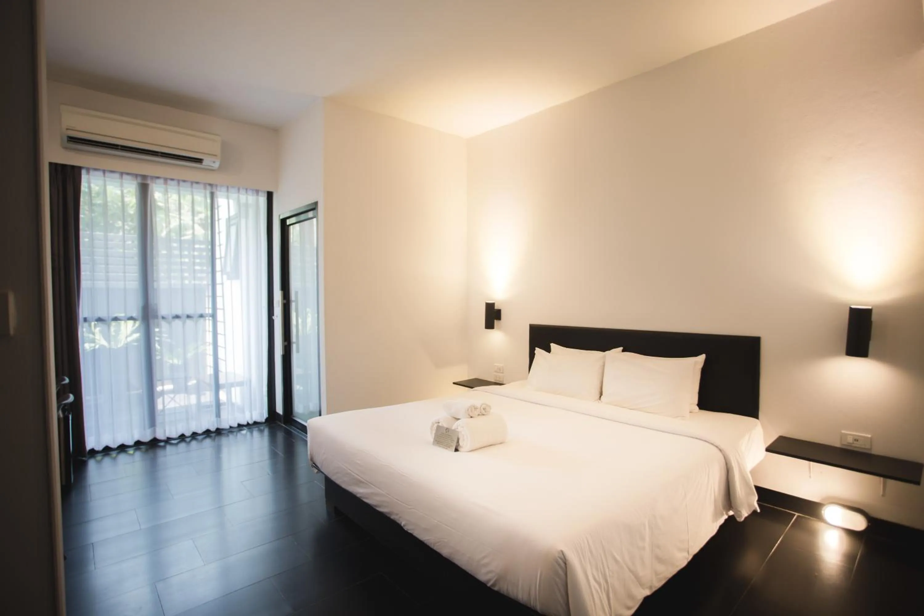 Bed in iWualai Hotel