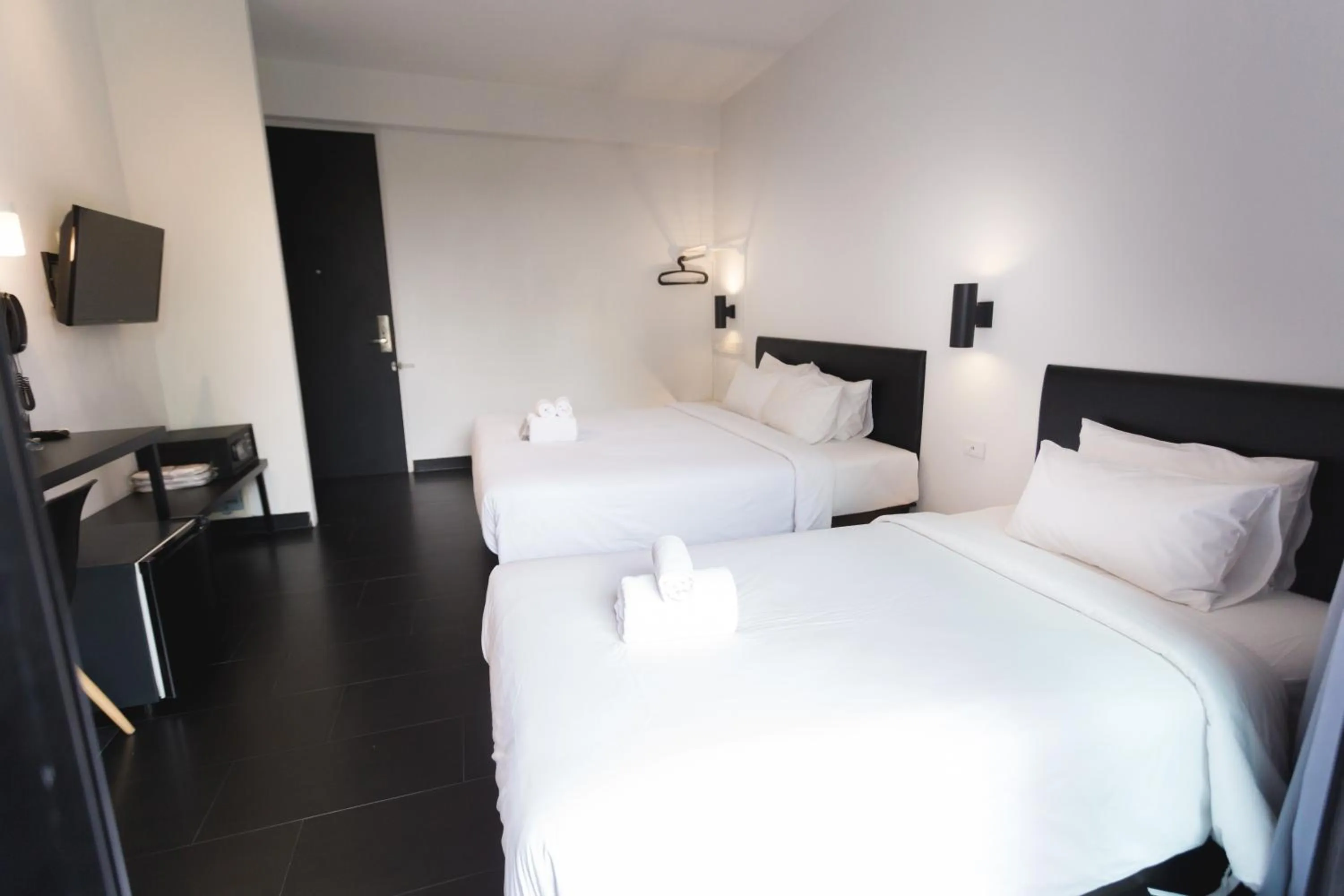 Bed in iWualai Hotel