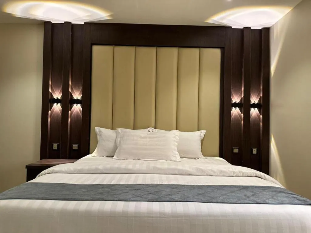 Bed in Makarim Palm Hotel