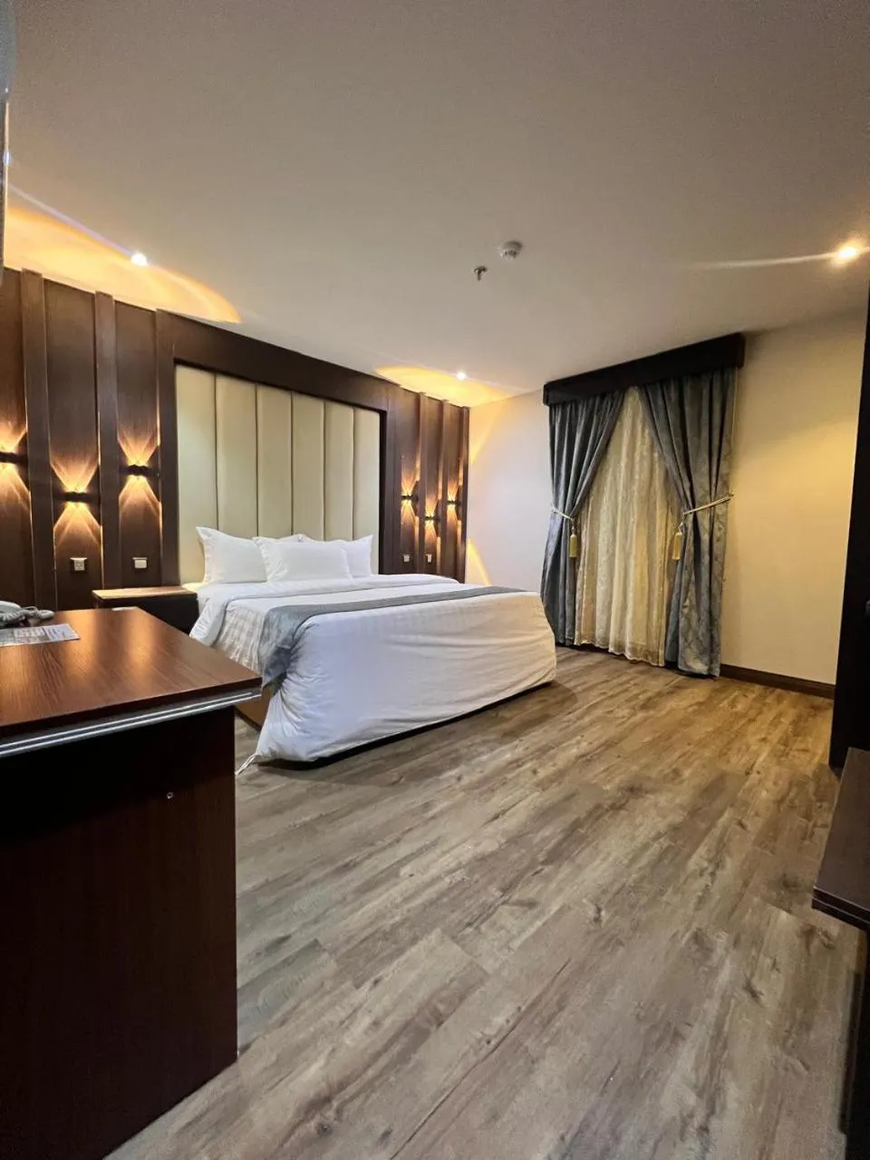 Bed in Makarim Palm Hotel