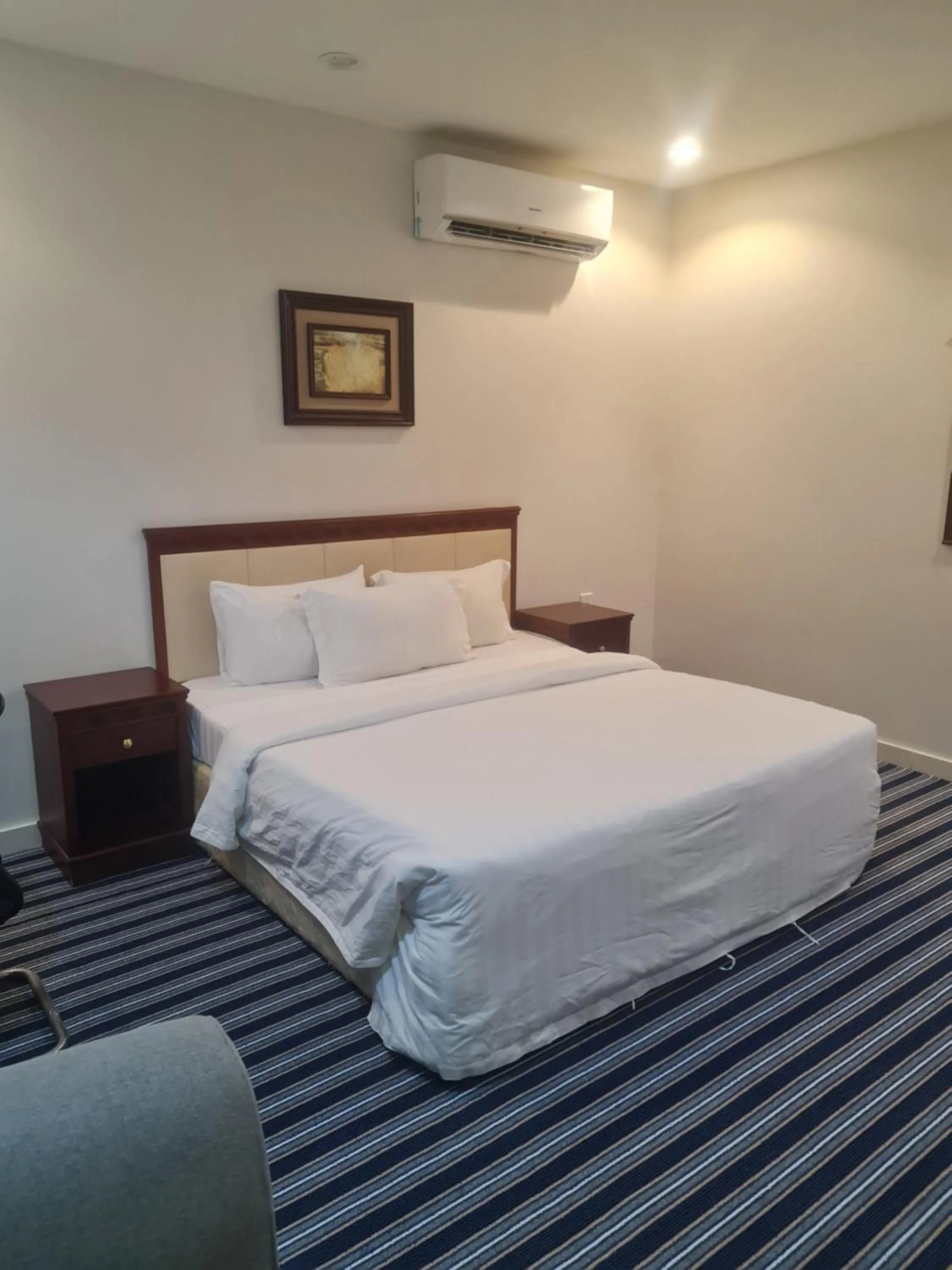 Bed in Makarim Palm Hotel