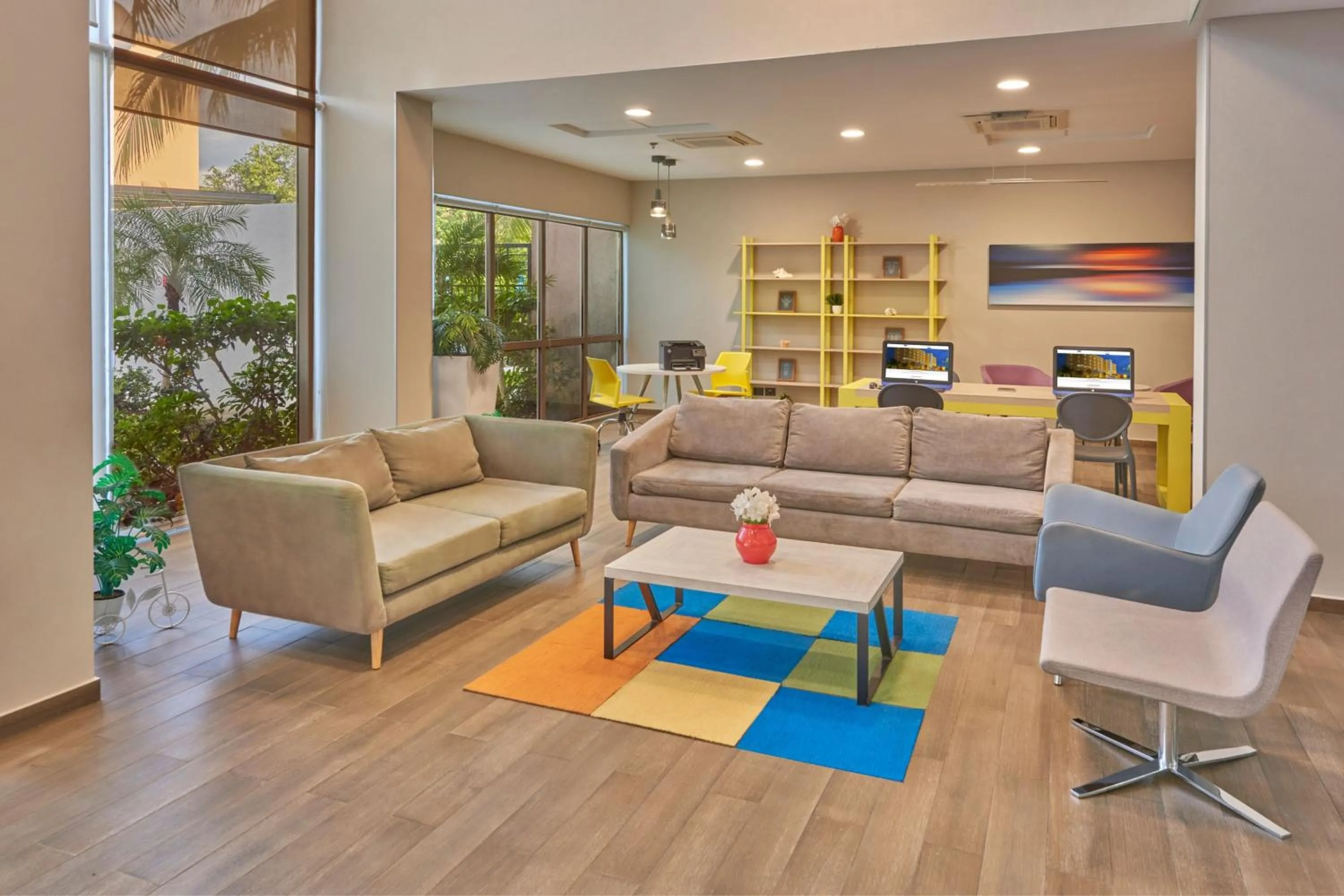 Lobby or reception in City Express Suites by Marriott Playa del Carmen