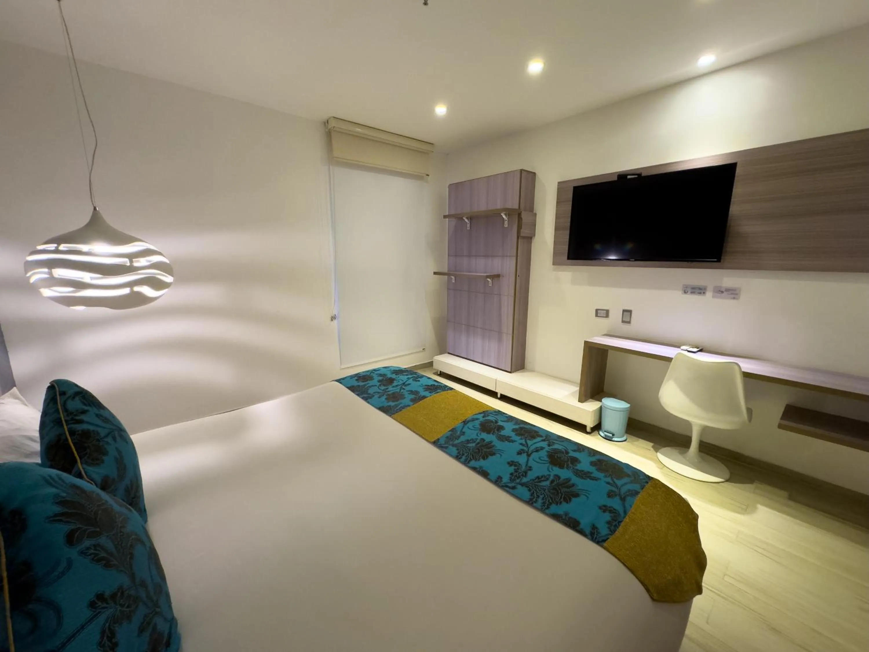 Bed in Hotel Catedral Plaza