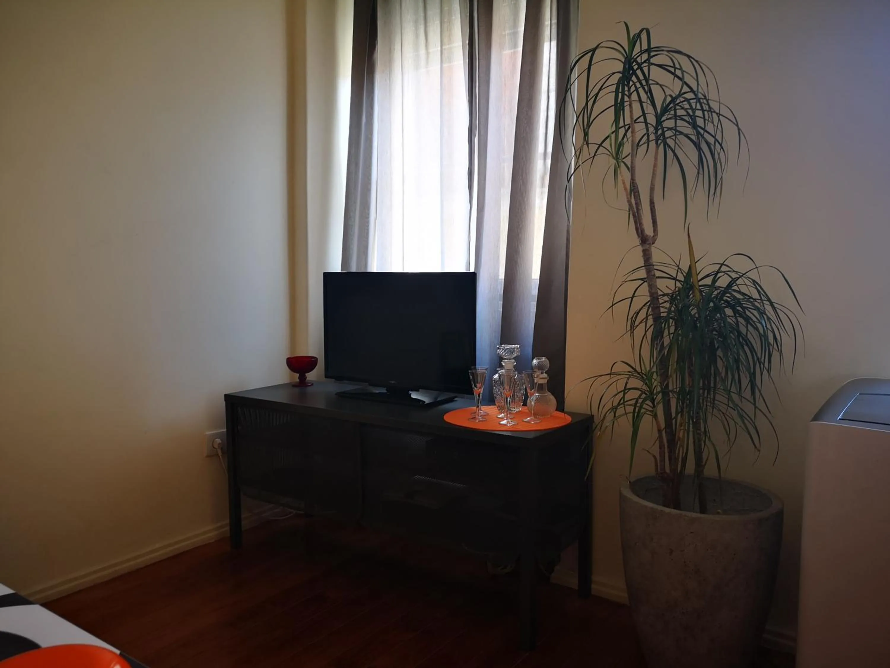 Communal lounge/ TV room in Cardal Apartment