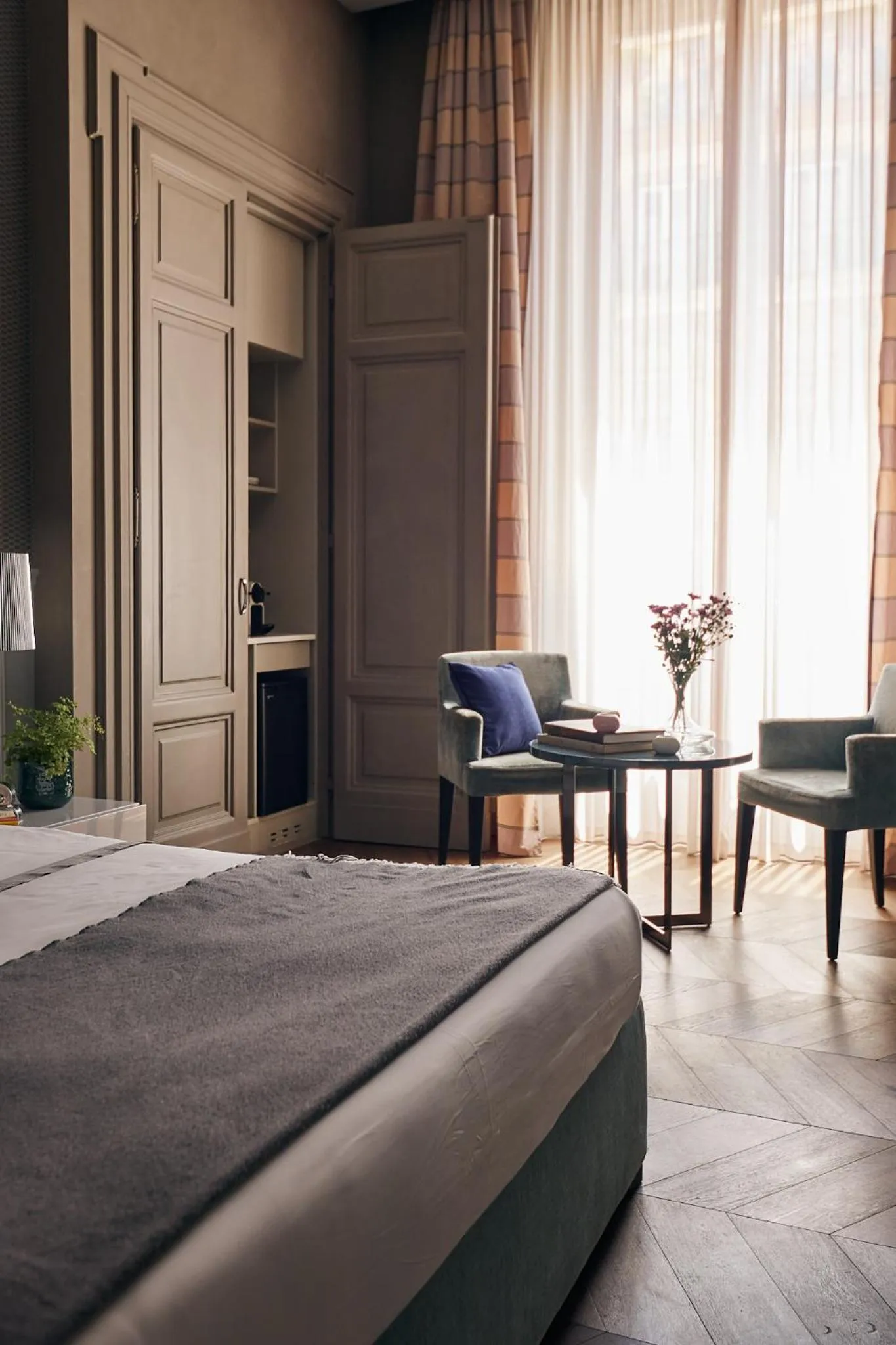 Bed in Le Quattro Dame Luxury Suites