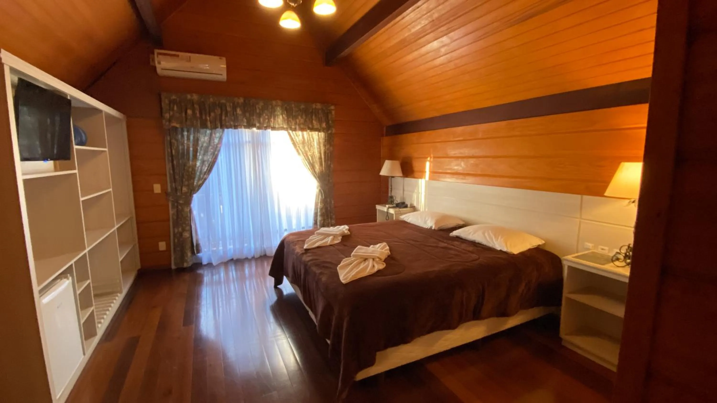 Bed in Pousada Das Papoulas