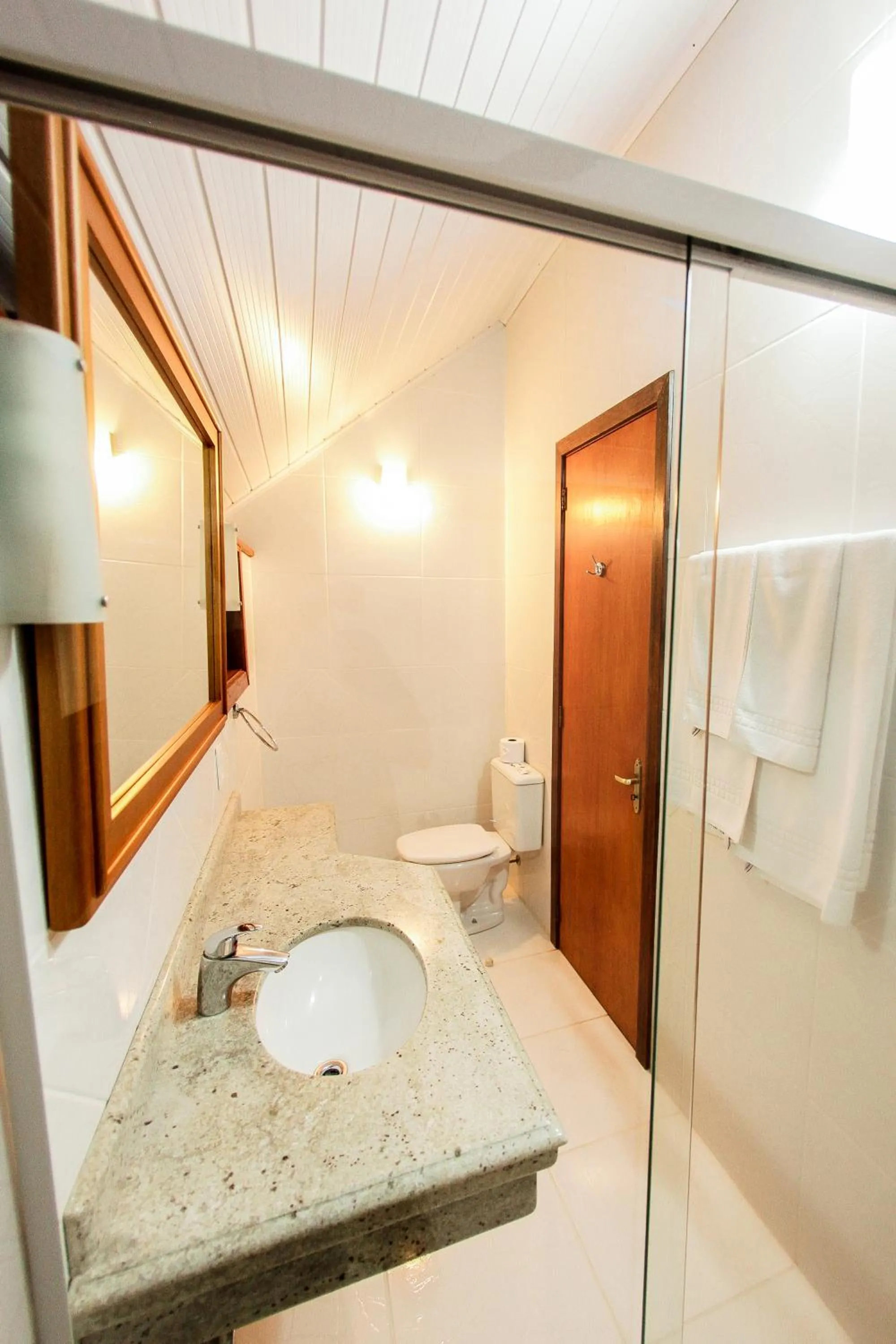 Bed in Pousada Das Papoulas