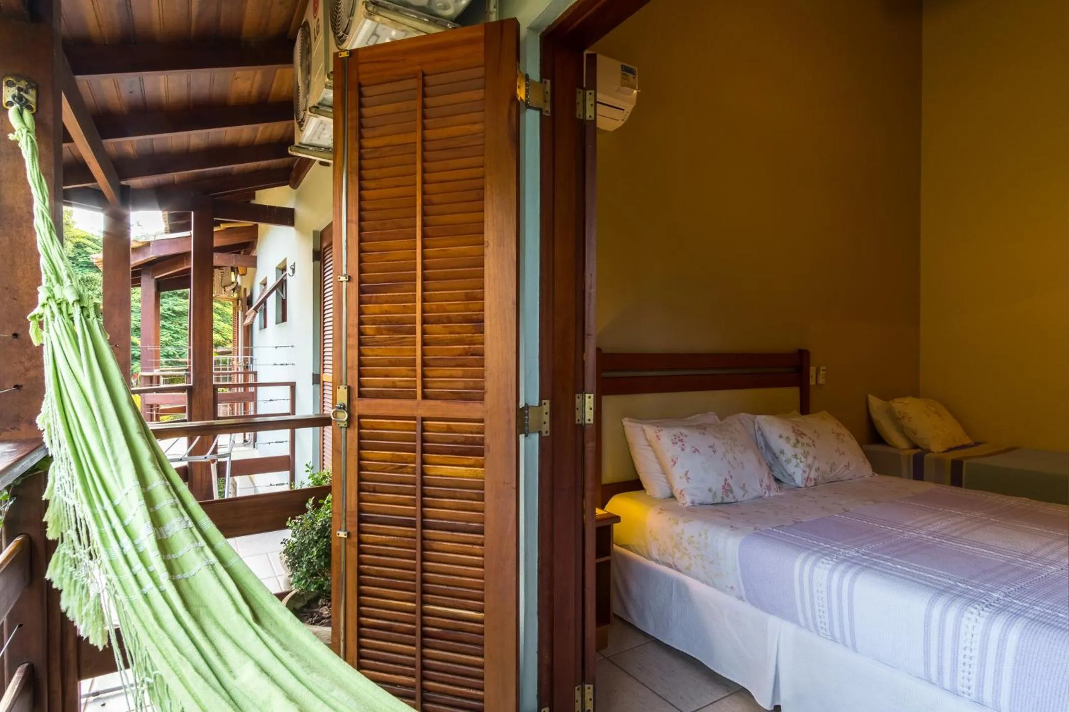 Bed in Pousada Recanto Montecarlo