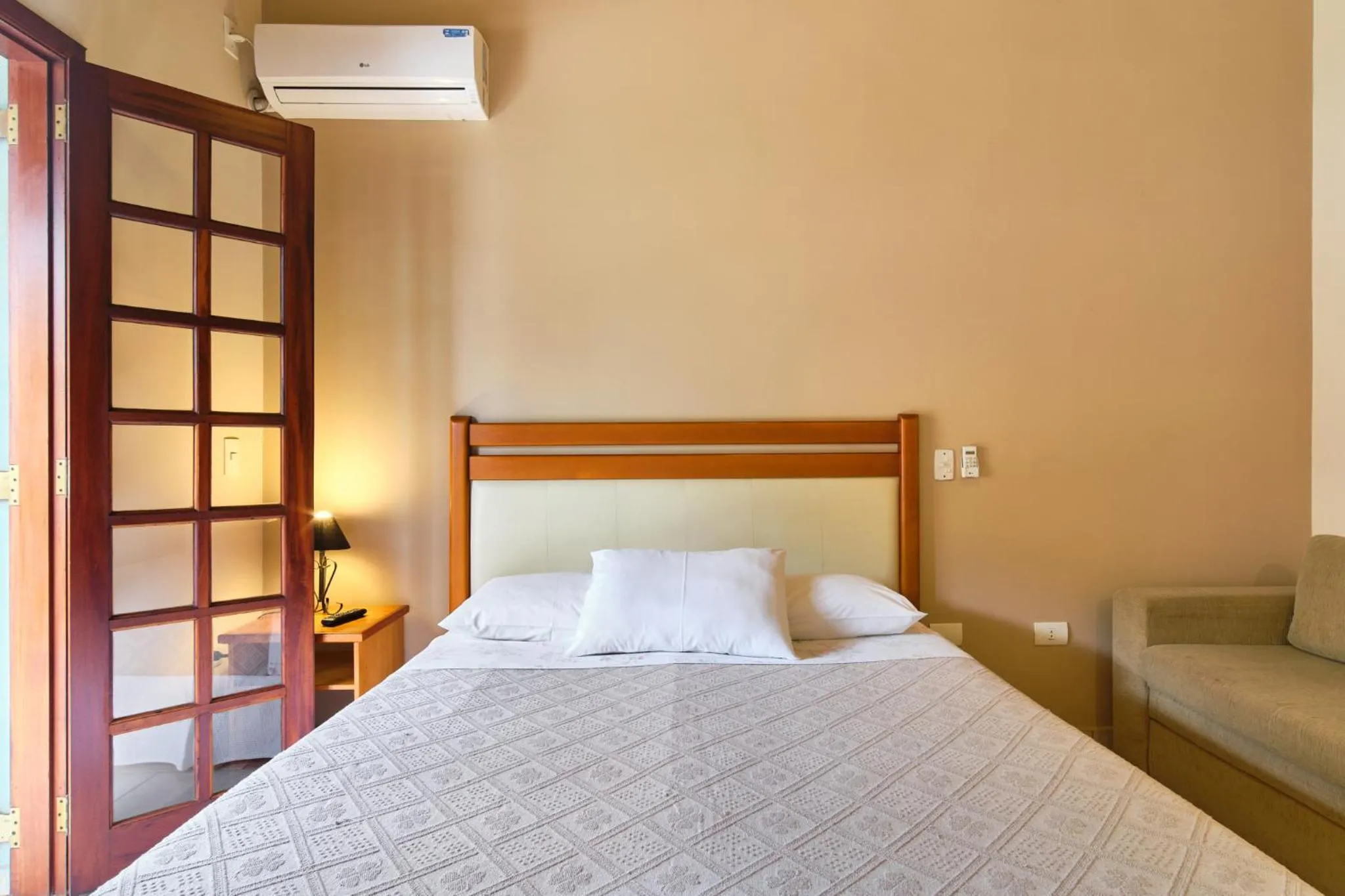 Bed in Pousada Recanto Montecarlo