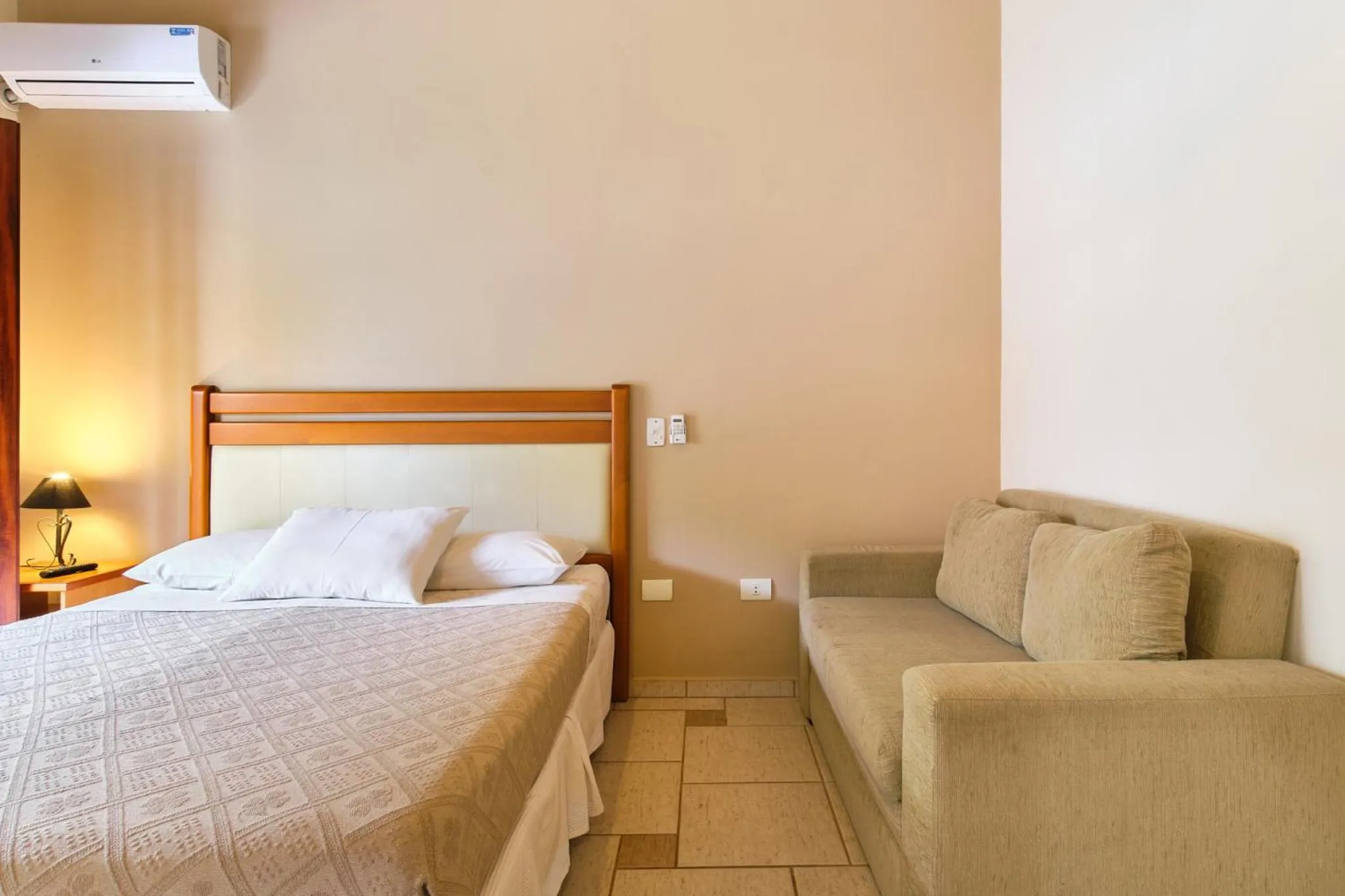 Bed in Pousada Recanto Montecarlo