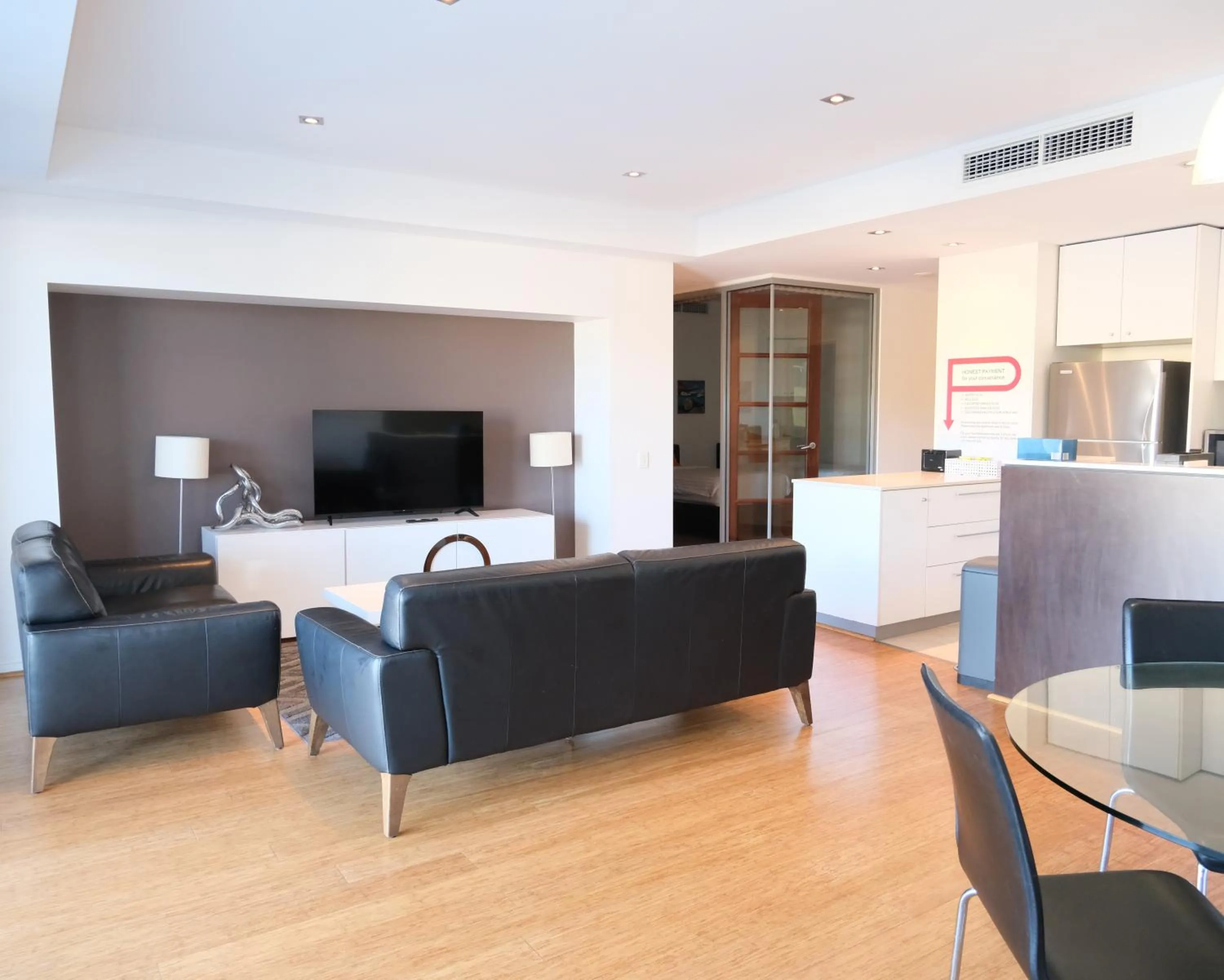 Communal lounge/ TV room in Gallery Serviced Apartments