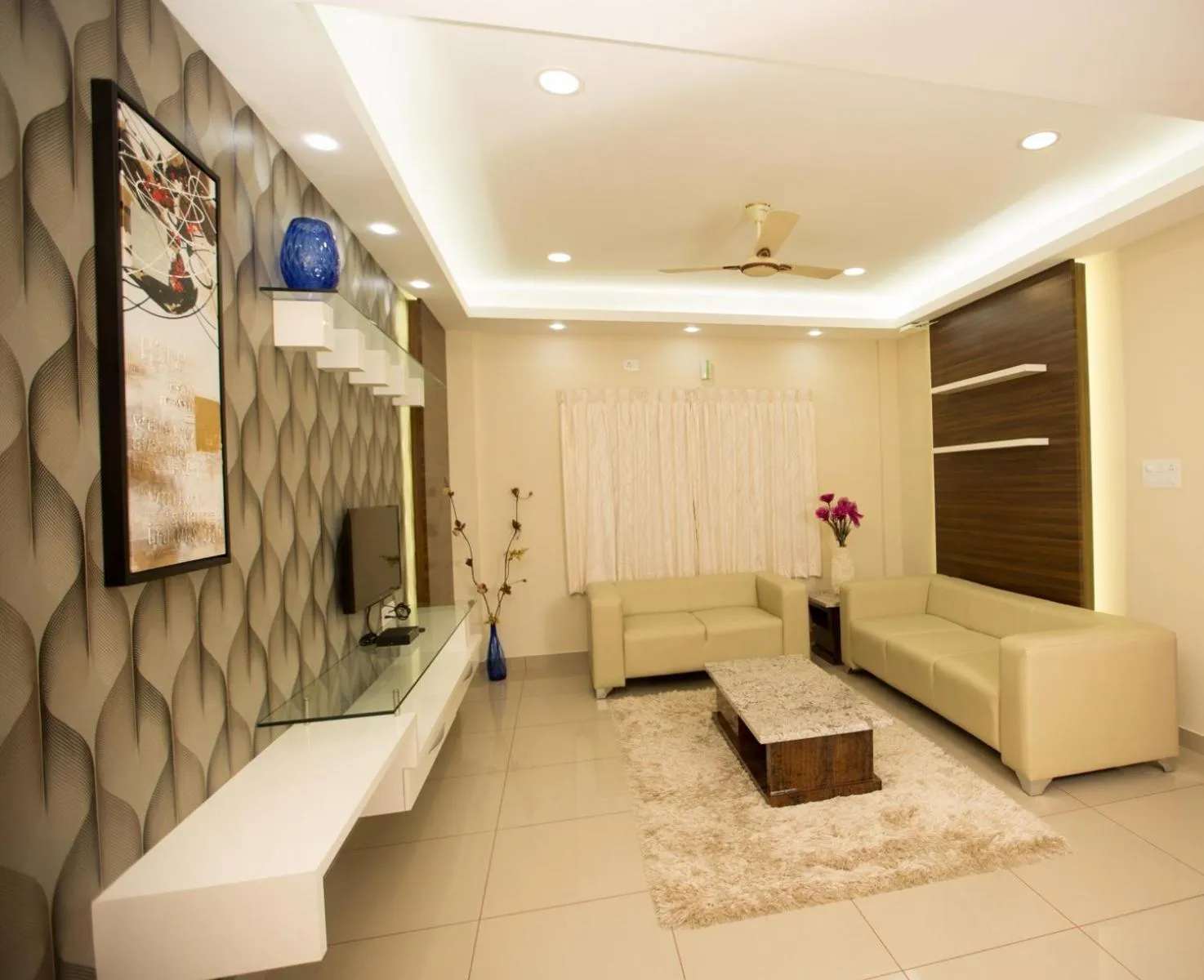 Communal lounge/ TV room in Benaka Suites