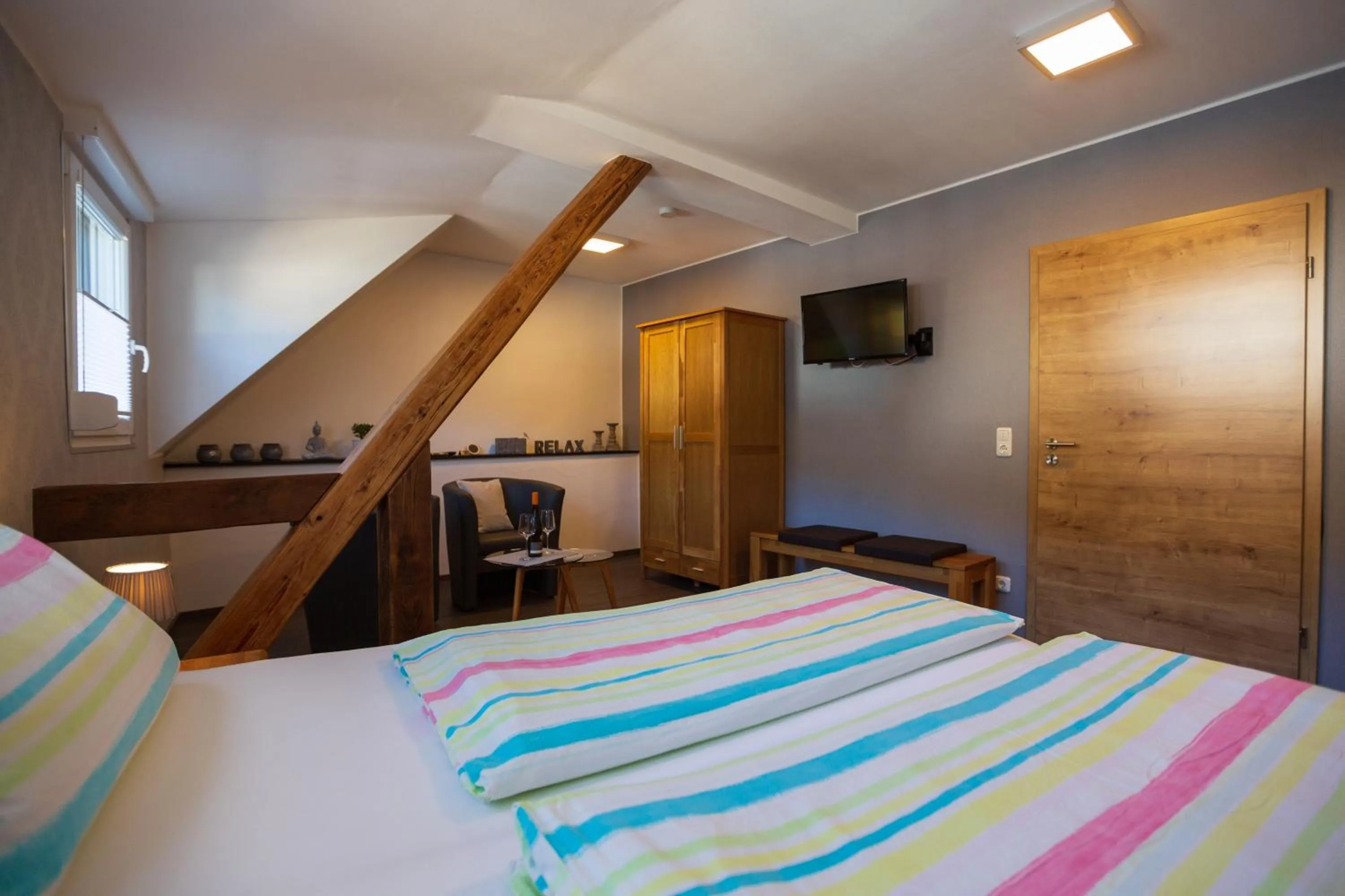 Photo of the whole room, Bed in Der Weinladen