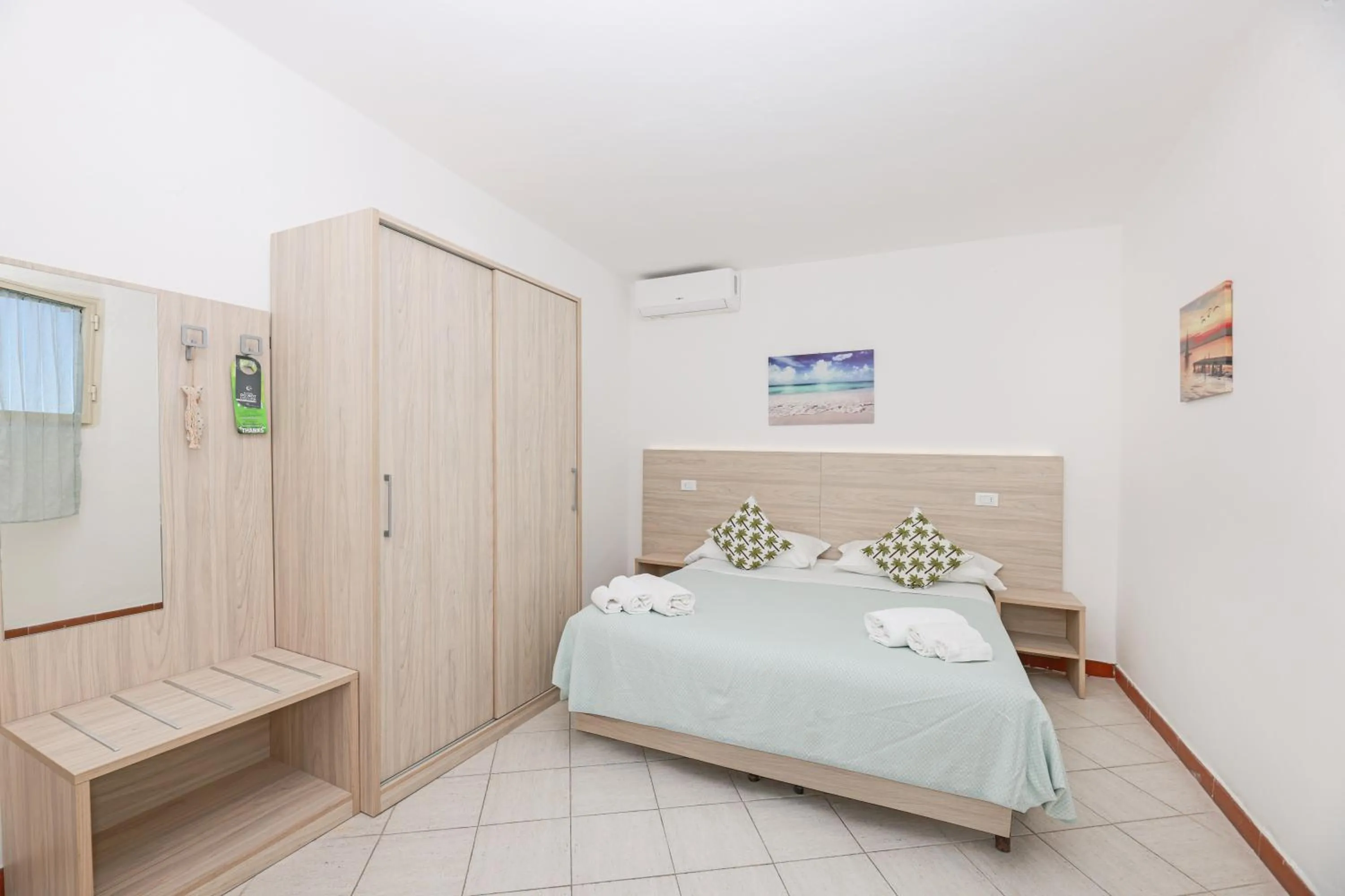 Bed in Hotel Le Ghiaie