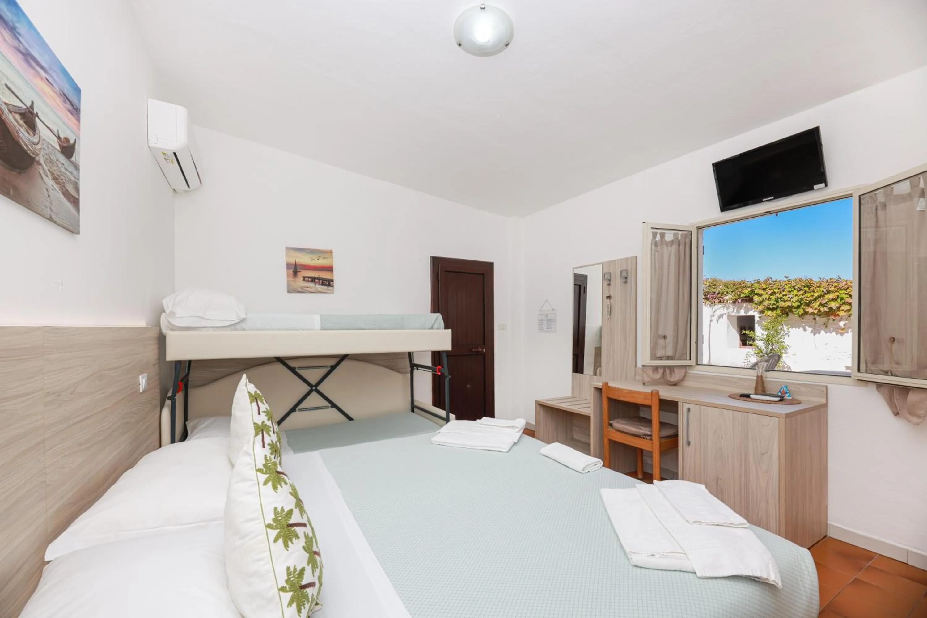 Bed in Hotel Le Ghiaie