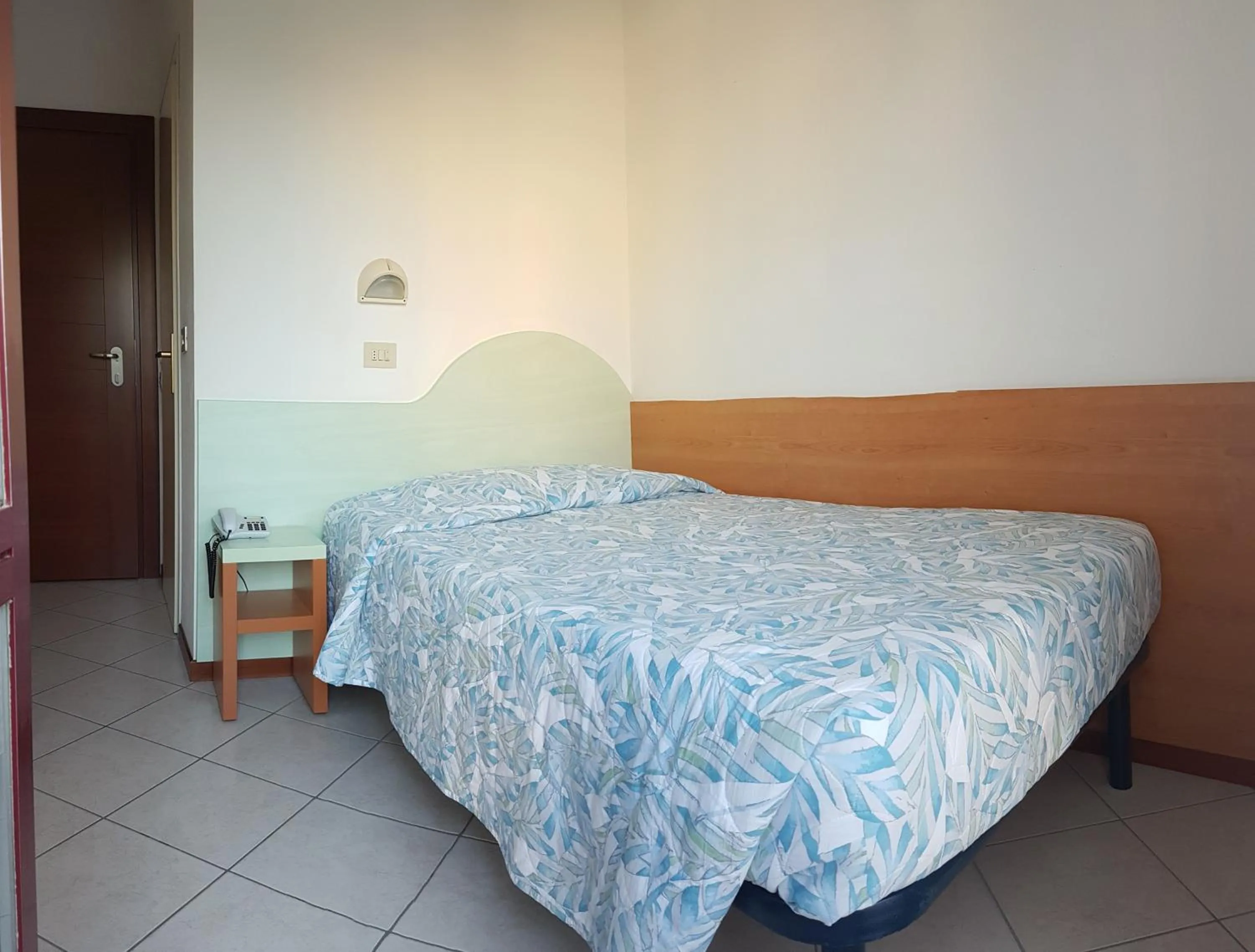 Bedroom in Hotel Parini