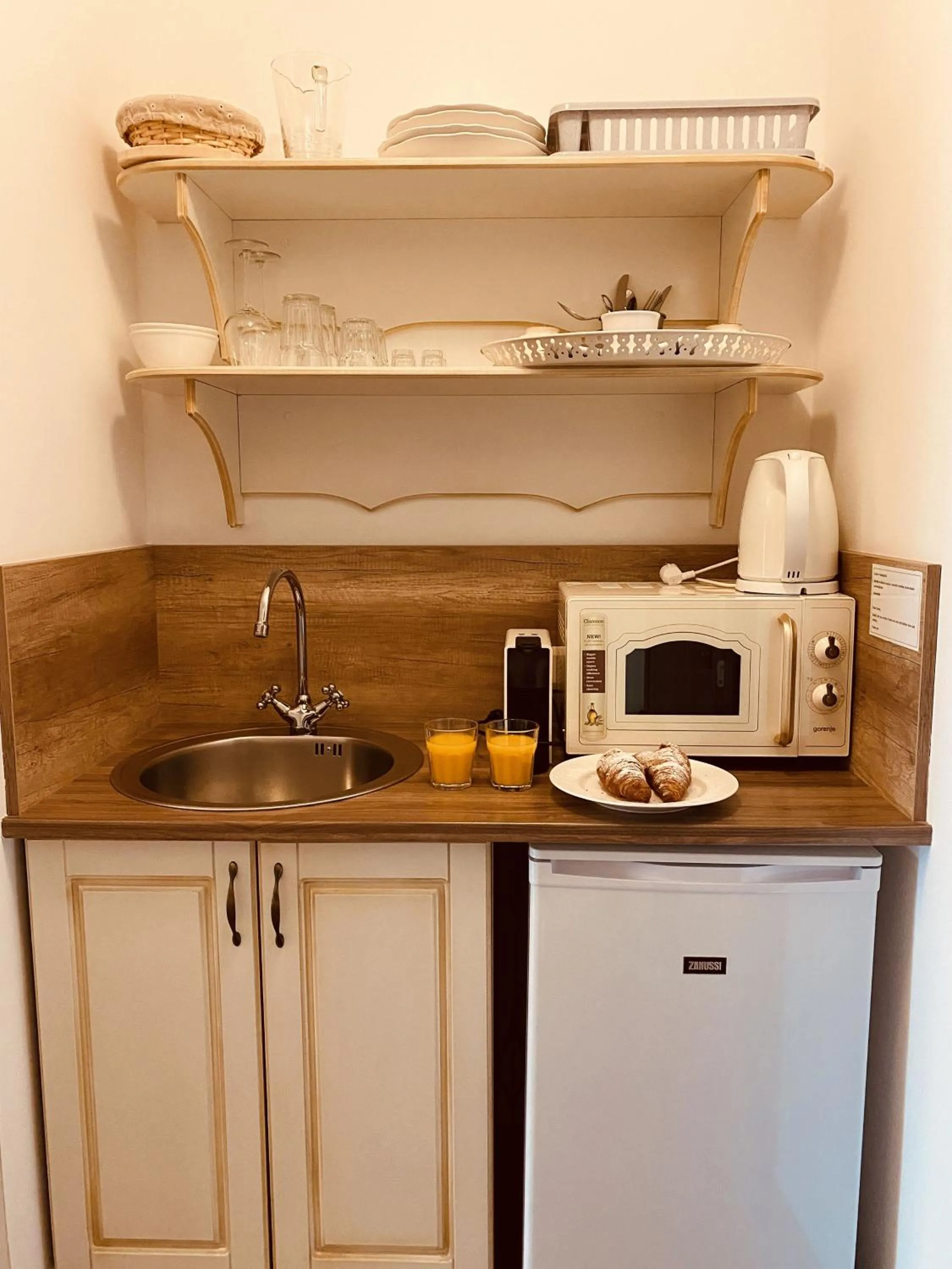 Kitchen or kitchenette in Barackvirág Apartmanház