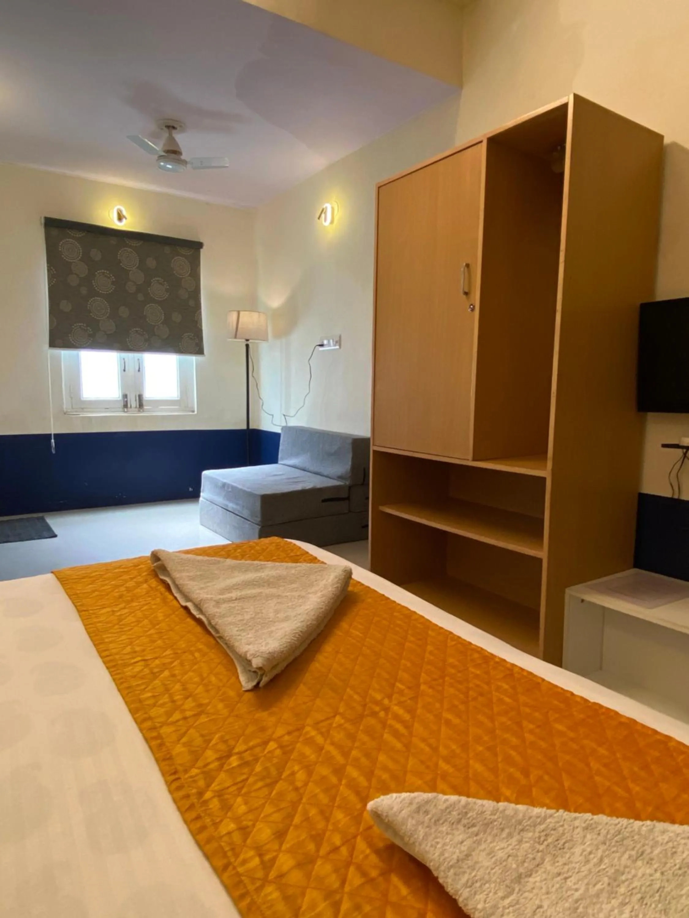 wardrobe, Bed in Chitra Katha - A Story Per Stay