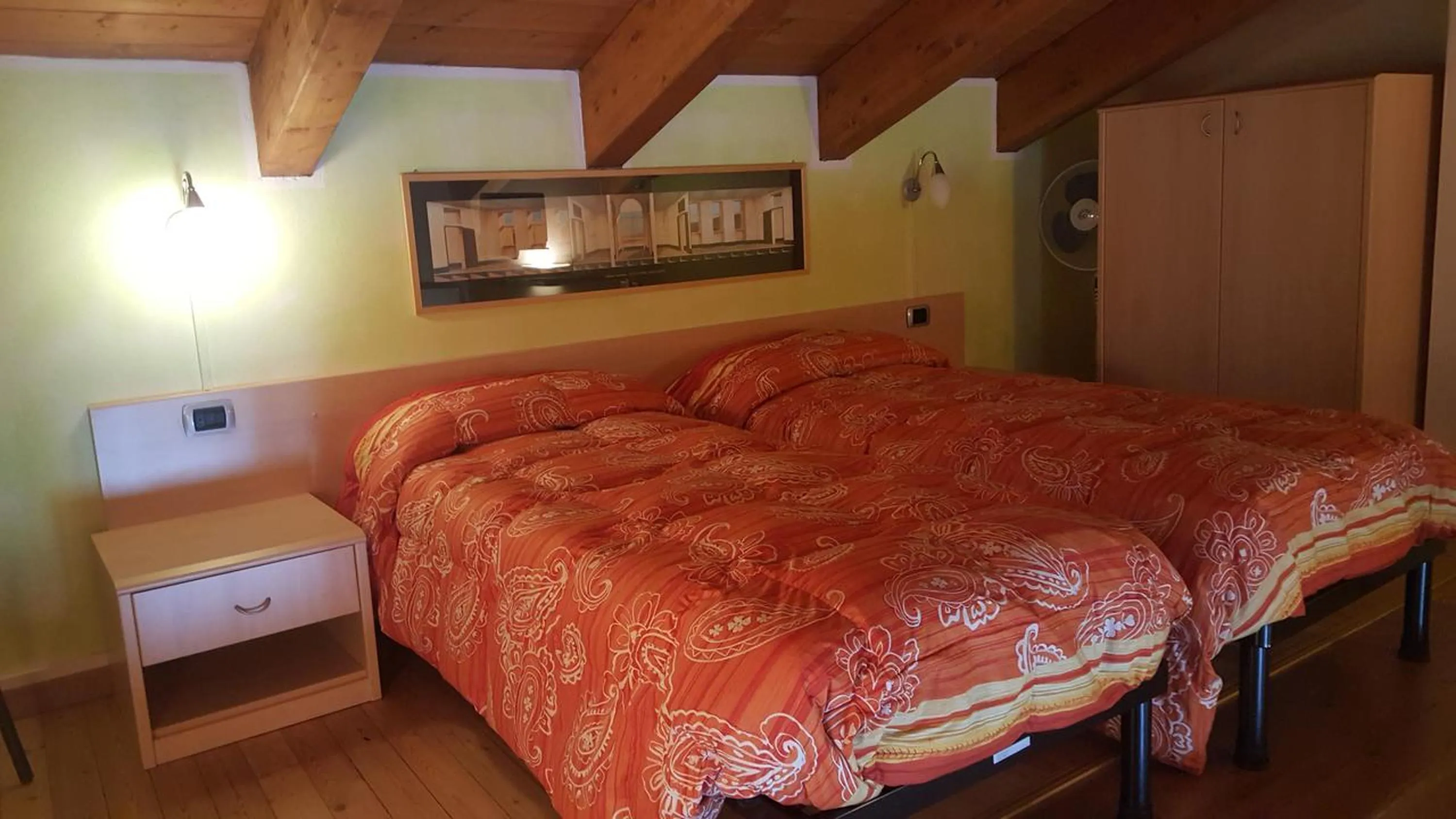 Bed in La Baita D'Oro Ristorante Residence