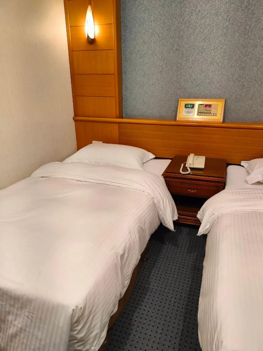 Bed in Champion Hotel