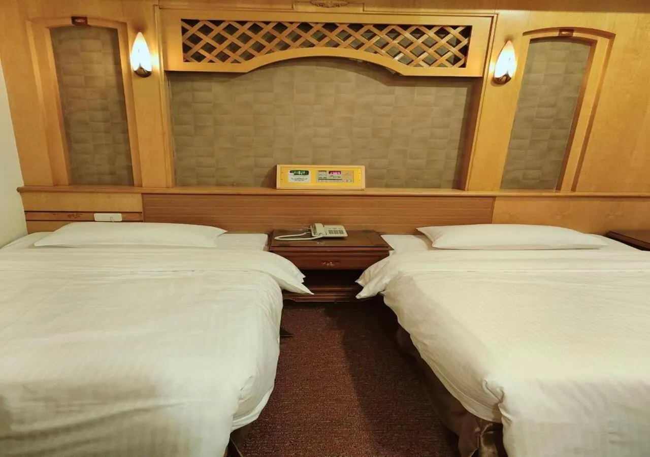 Bed in Champion Hotel