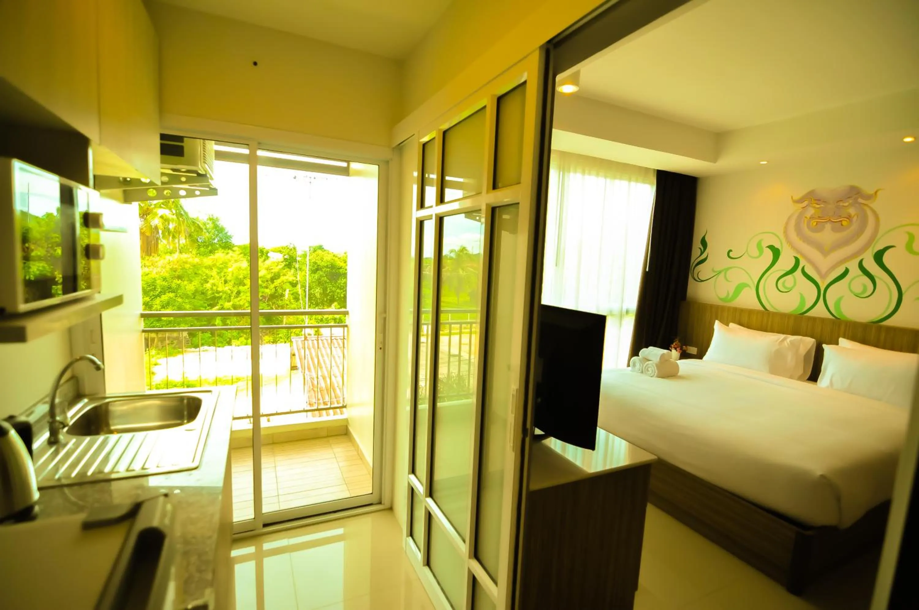 Kitchen or kitchenette, Bed in The Sila Hotel