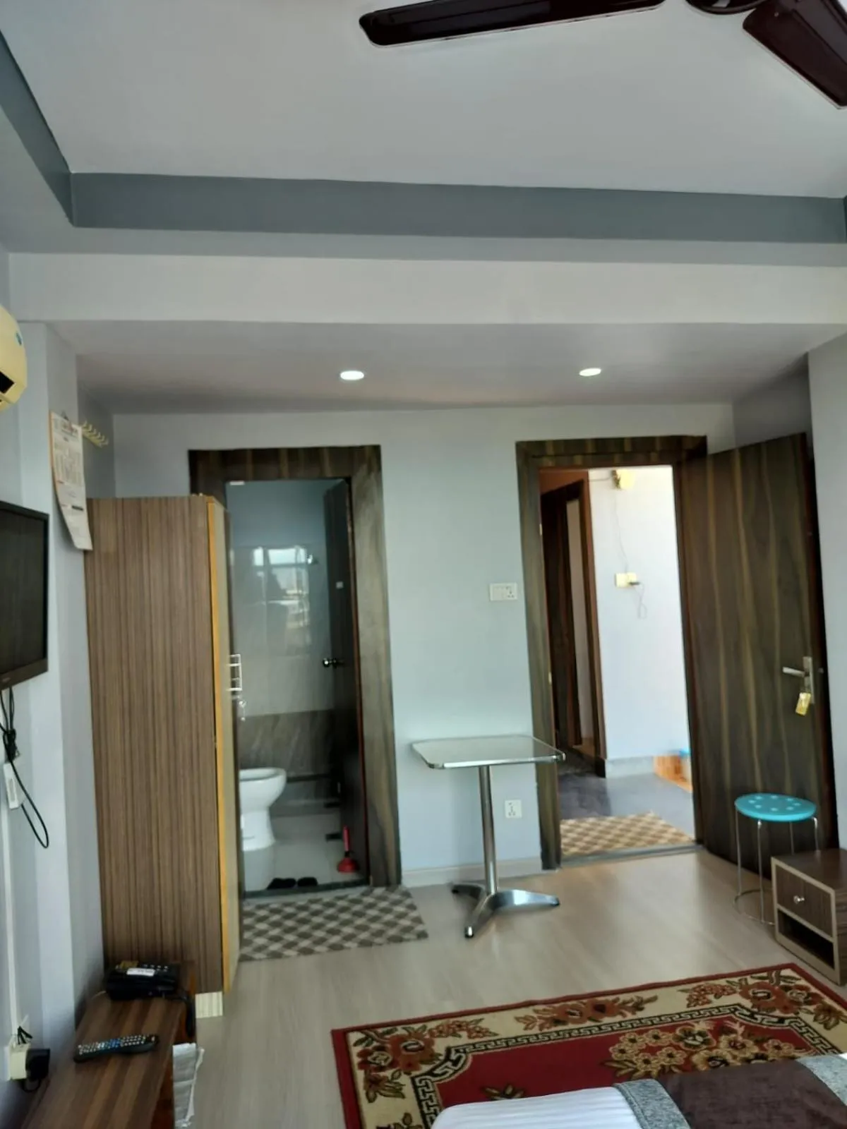 Bed in Three Brothers Apartment and Hotel