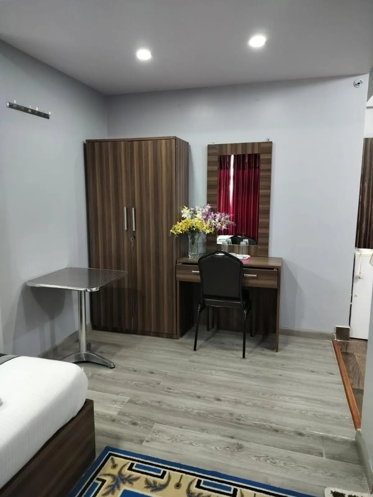 Bed in Three Brothers Apartment and Hotel