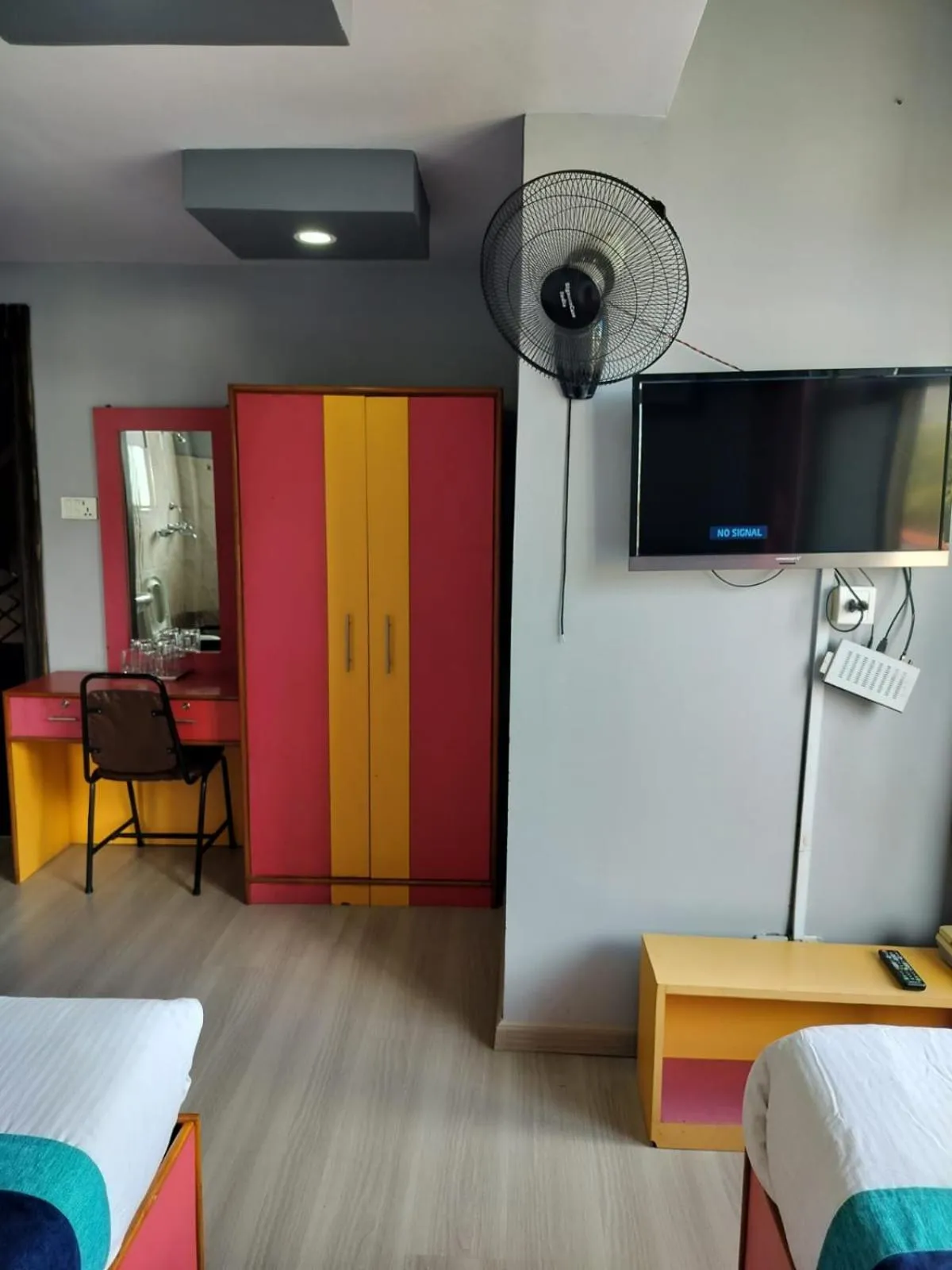 Bed in Three Brothers Apartment and Hotel