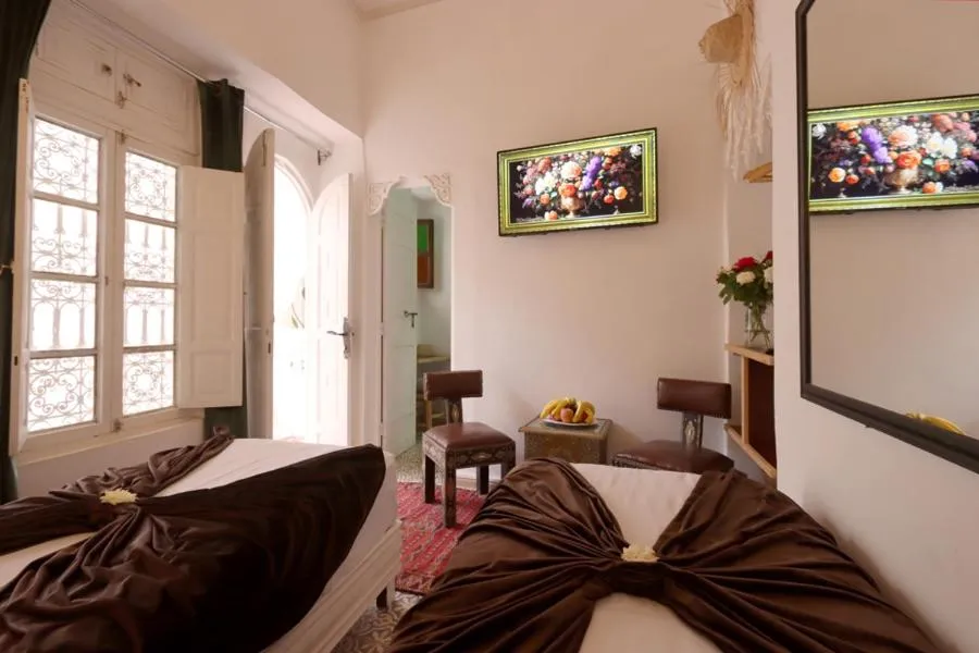 Communal lounge/ TV room in Riad Morocco Sky