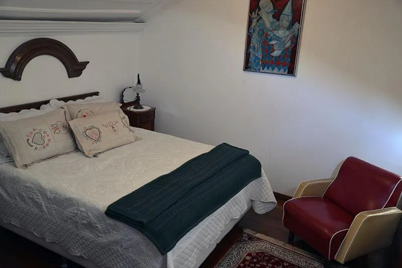 Bed in Pousada Guignard