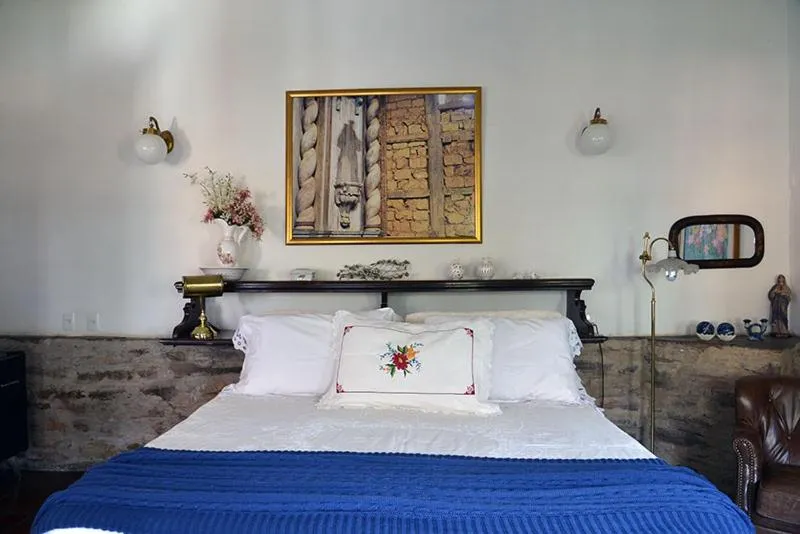 Bed in Pousada Guignard