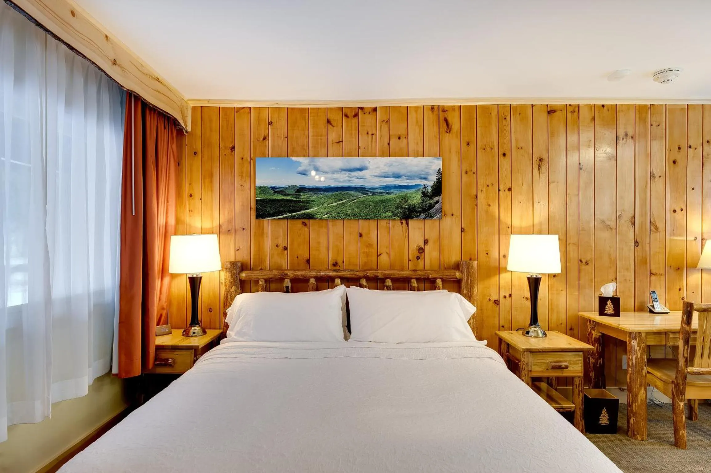 Bed in Adirondack Spruce Lodge