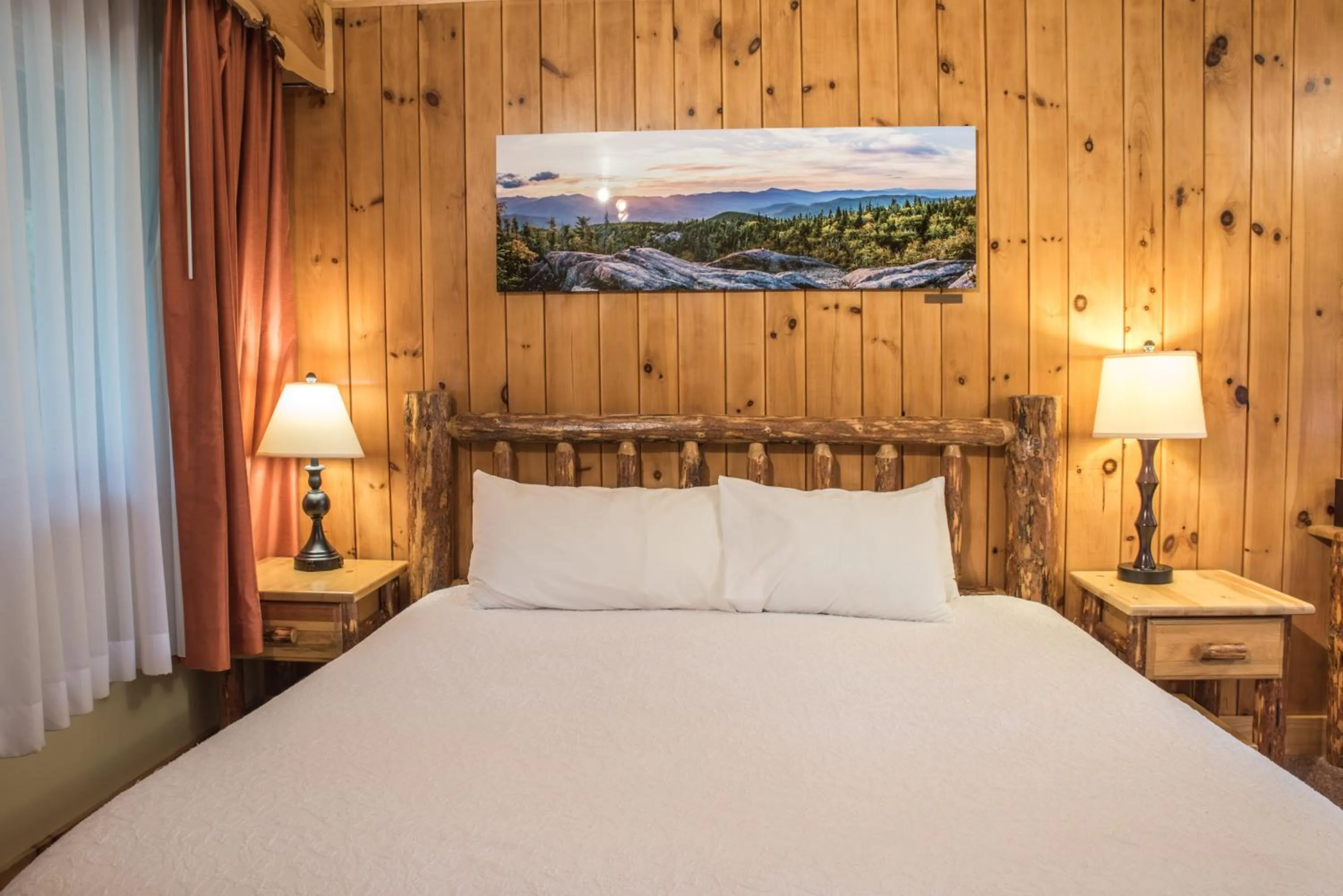 Bed in Adirondack Spruce Lodge