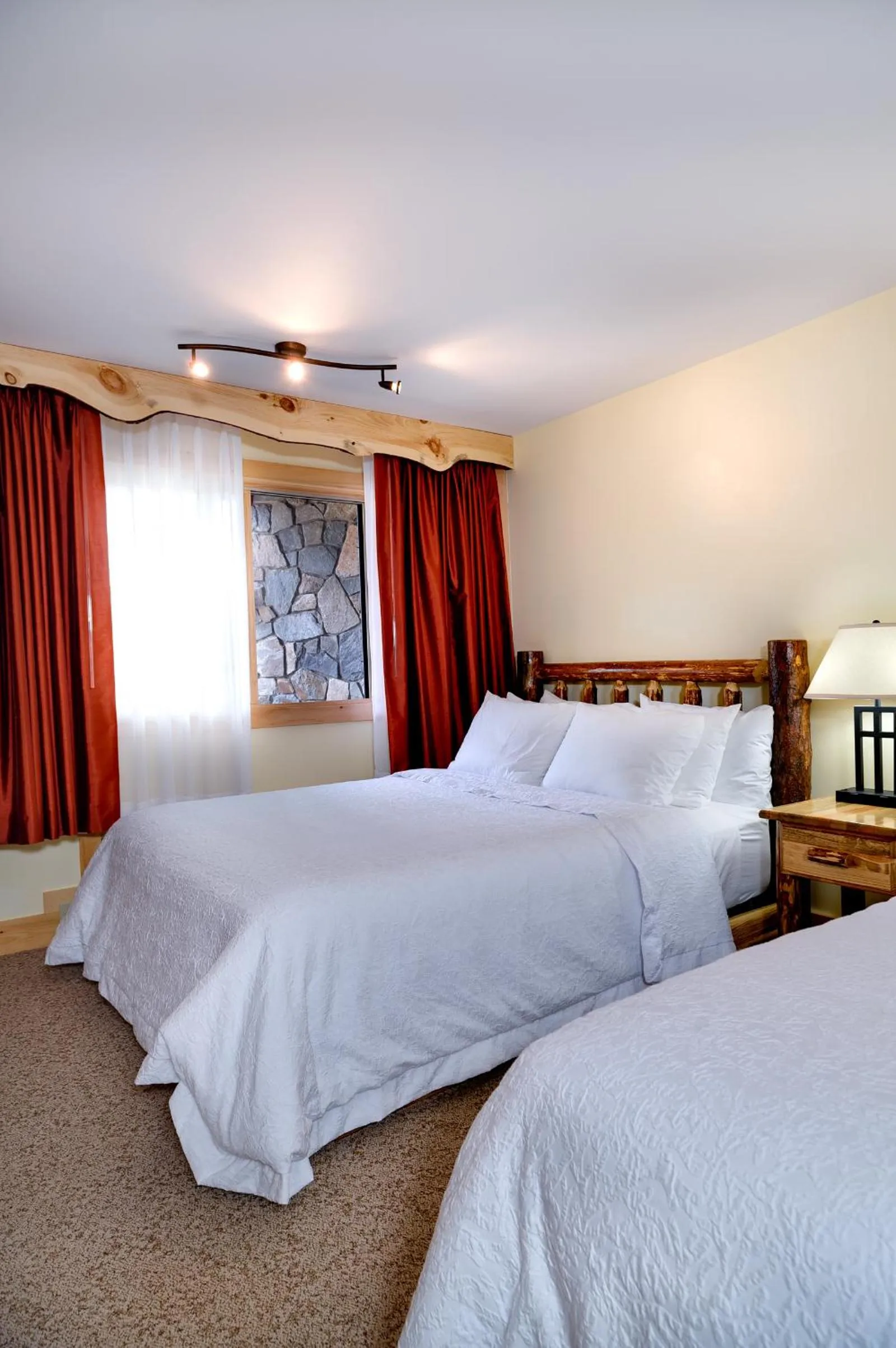 Decorative detail, Bed in Adirondack Spruce Lodge