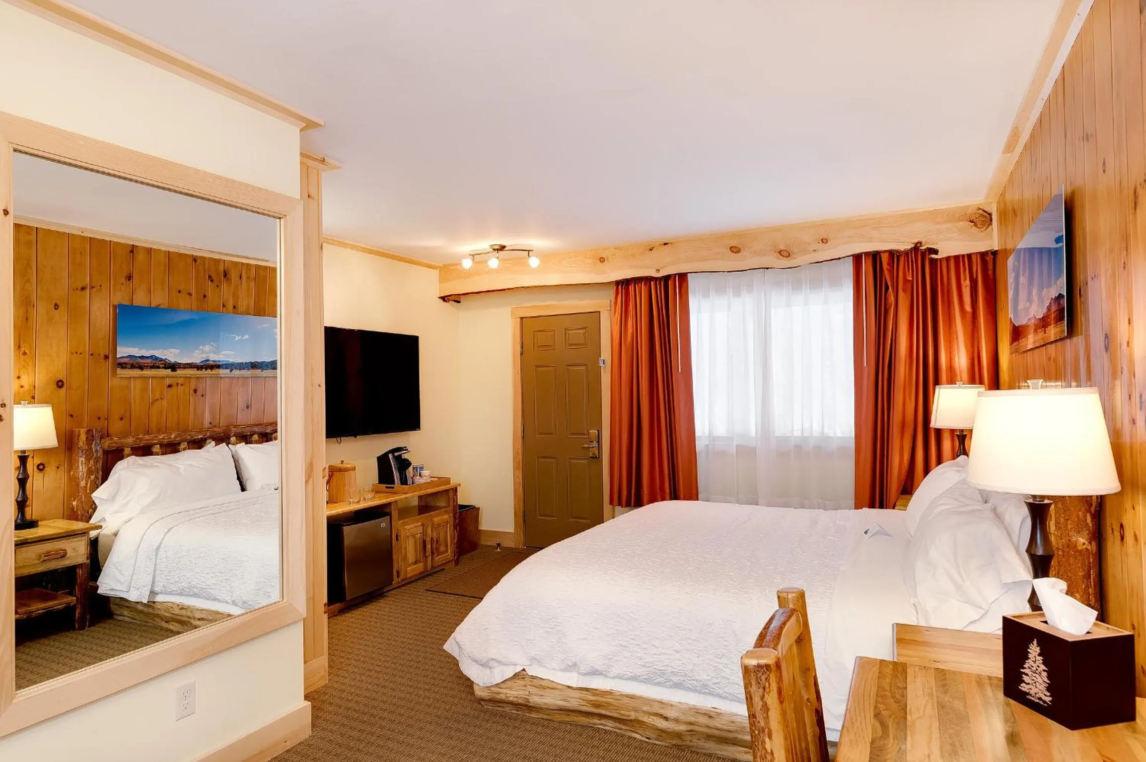 Bed in Adirondack Spruce Lodge