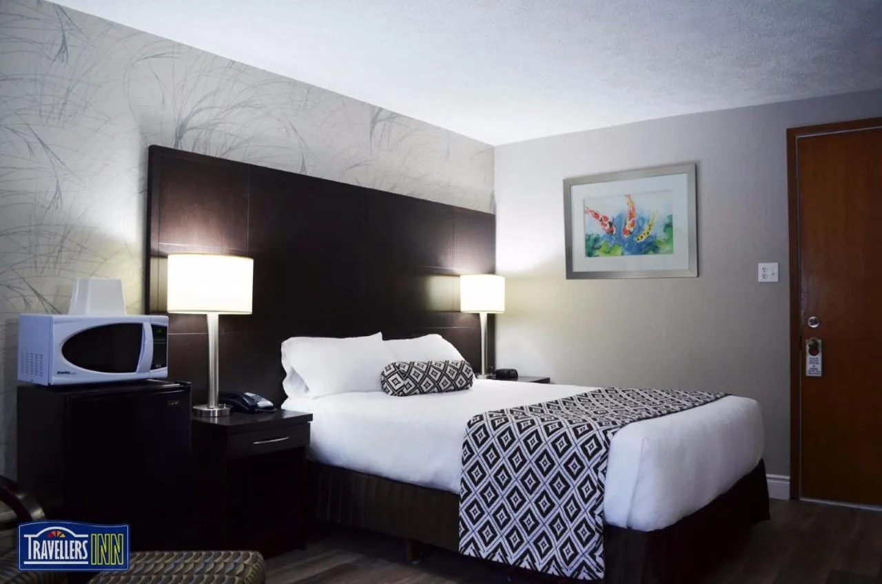 Bed in Travellers Inn