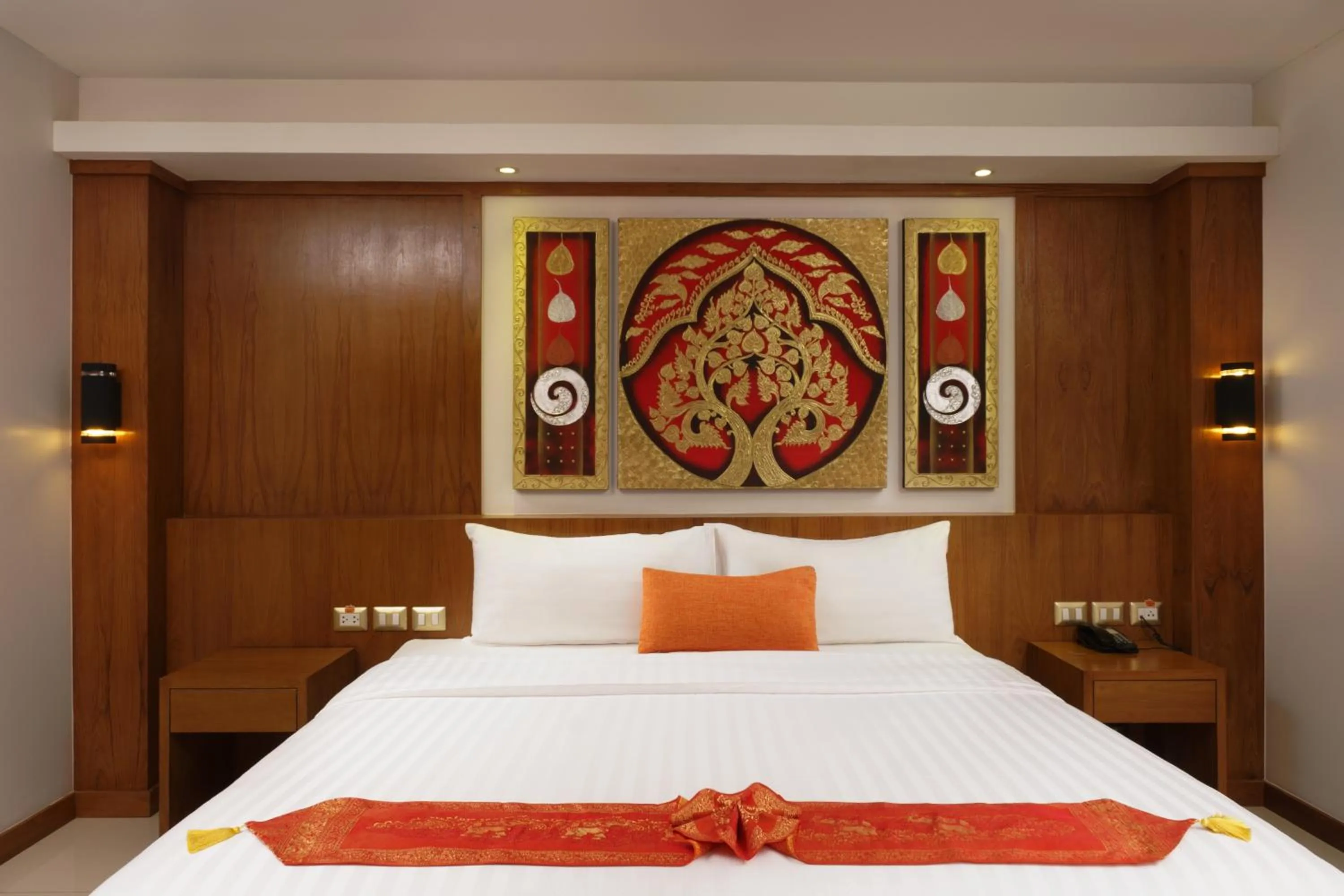 Bed in Chabana Kamala Hotel