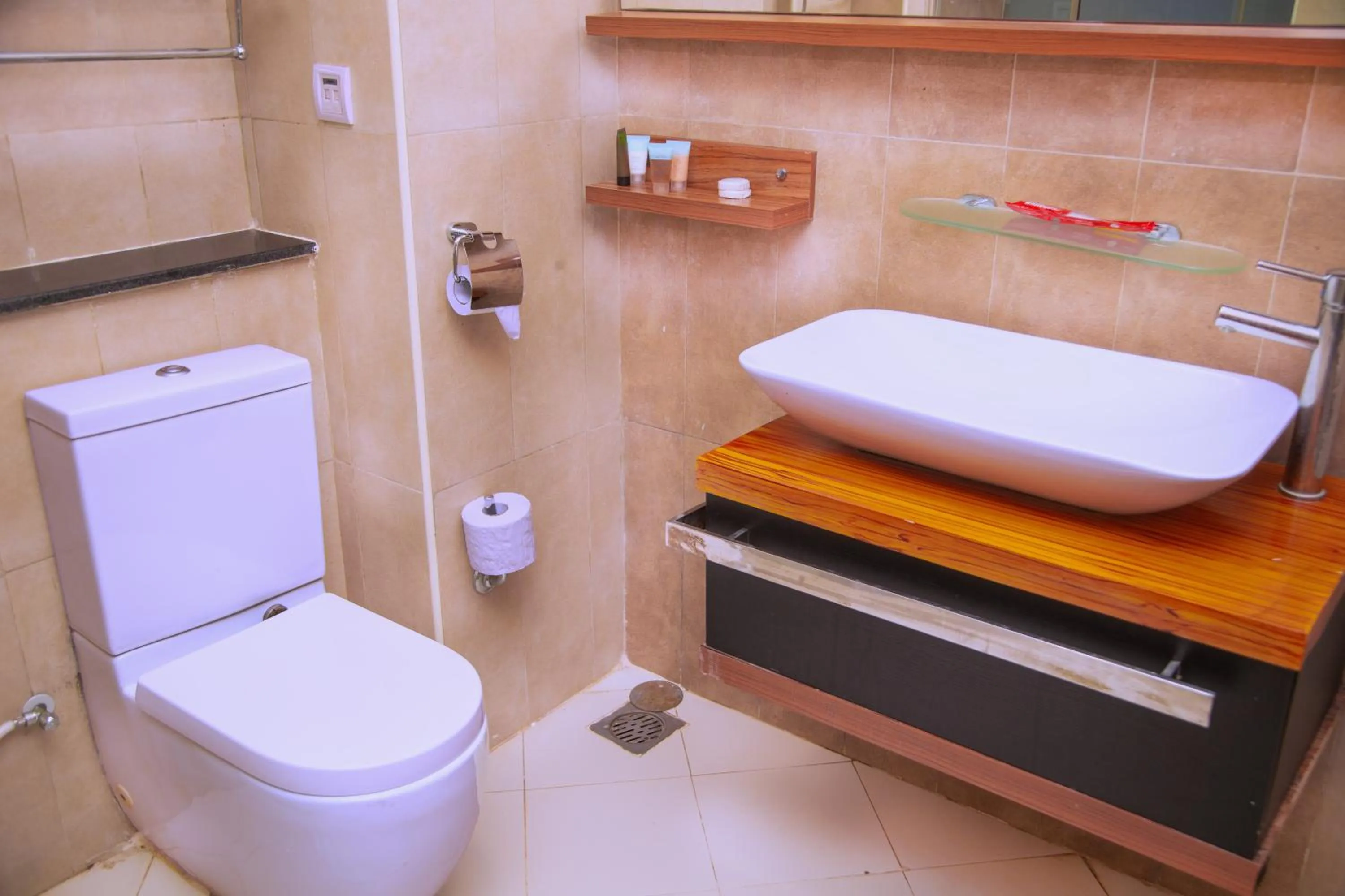 Shower in Tanga Beach Resort & Spa