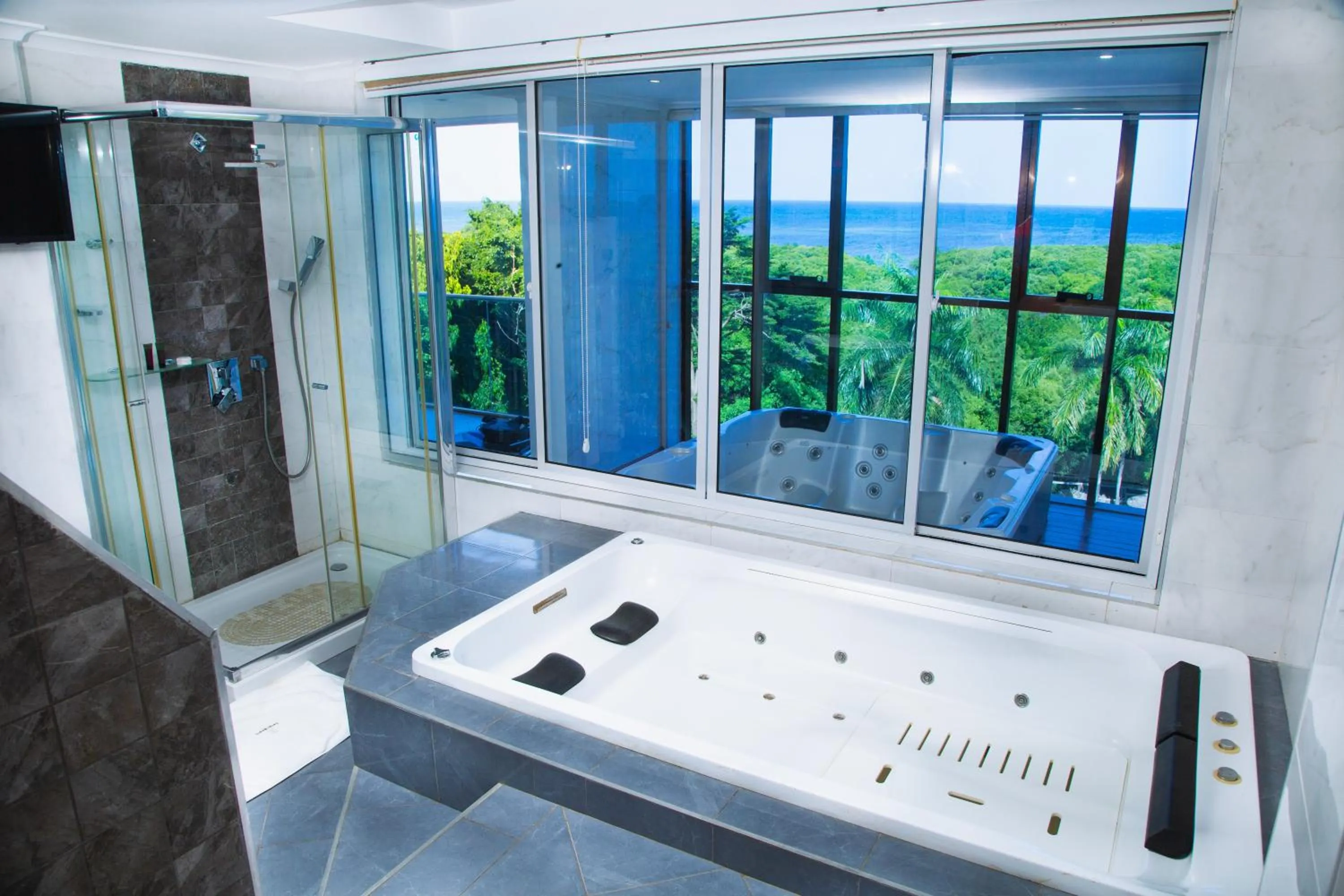 Bathroom in Tanga Beach Resort & Spa