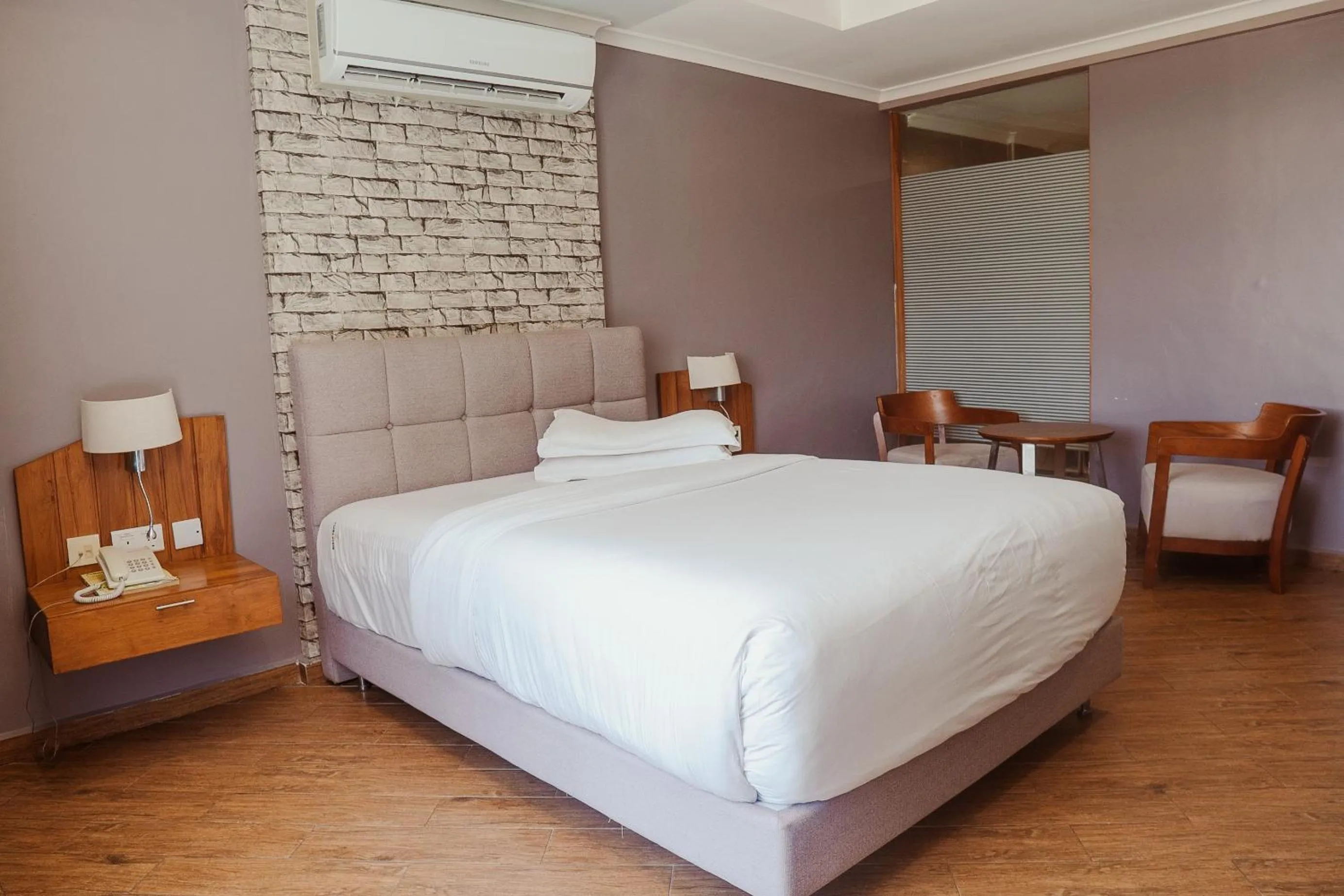 Bed in Tanga Beach Resort & Spa