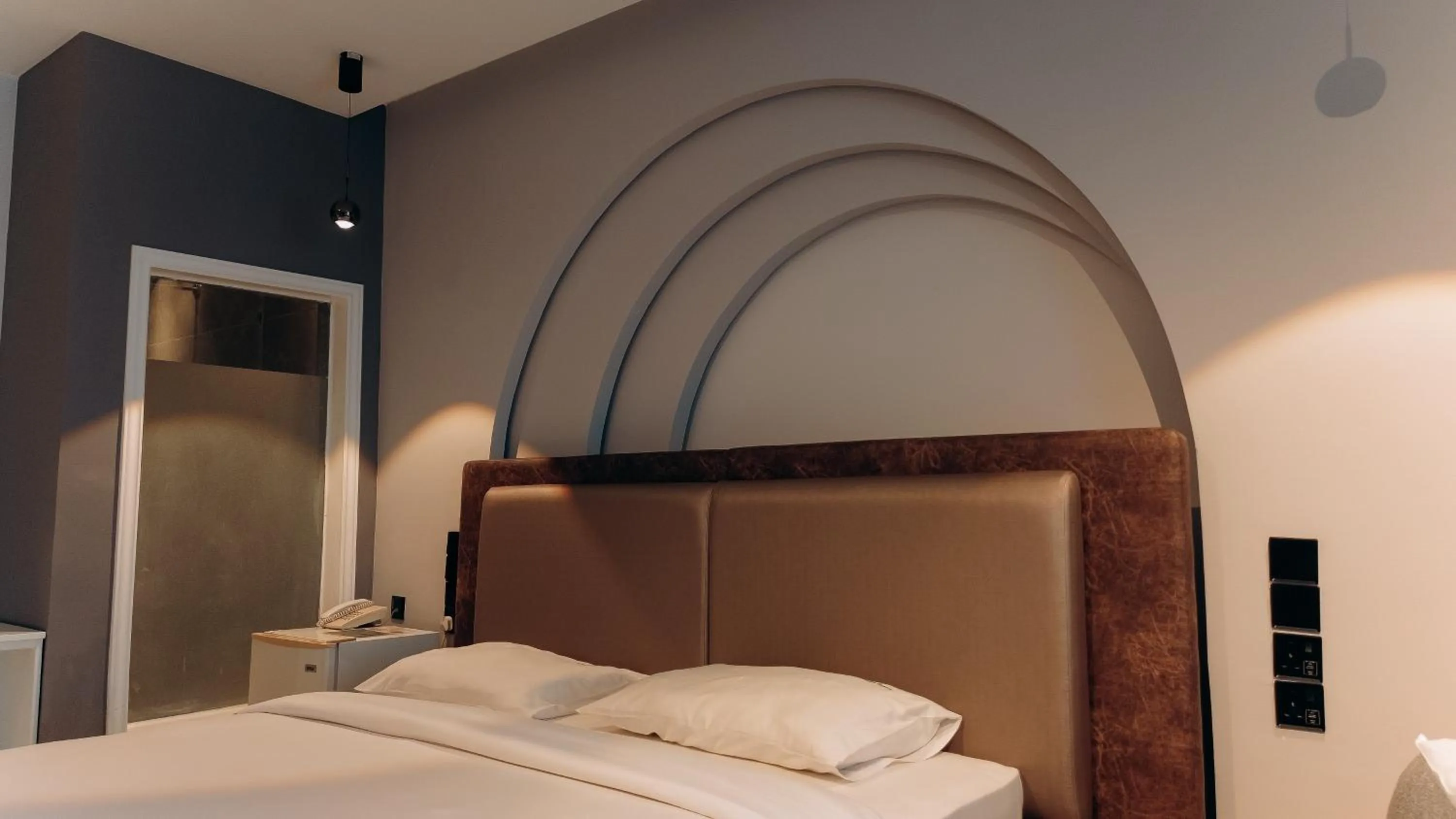 Bed in Tanga Beach Resort & Spa