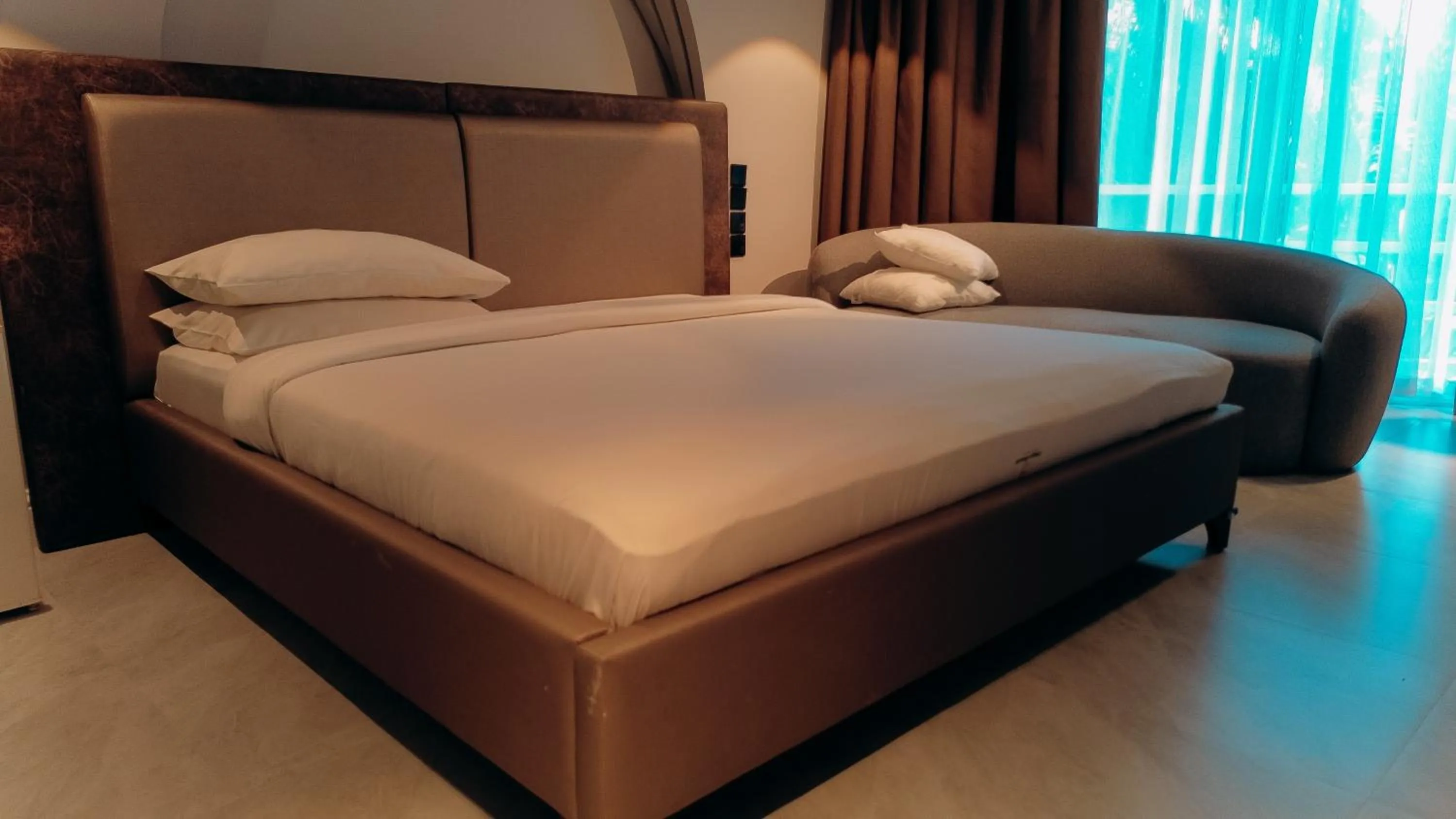 Bed in Tanga Beach Resort & Spa