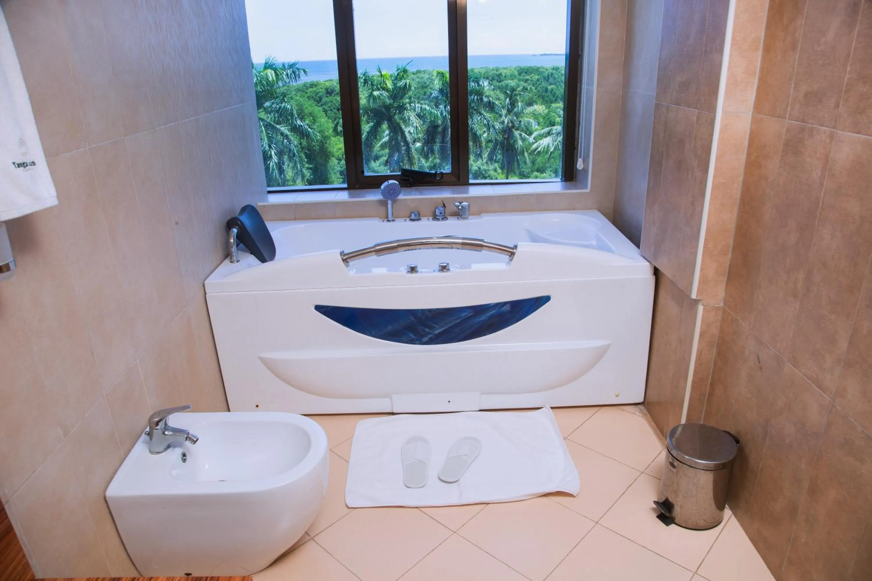 Bathroom in Tanga Beach Resort & Spa