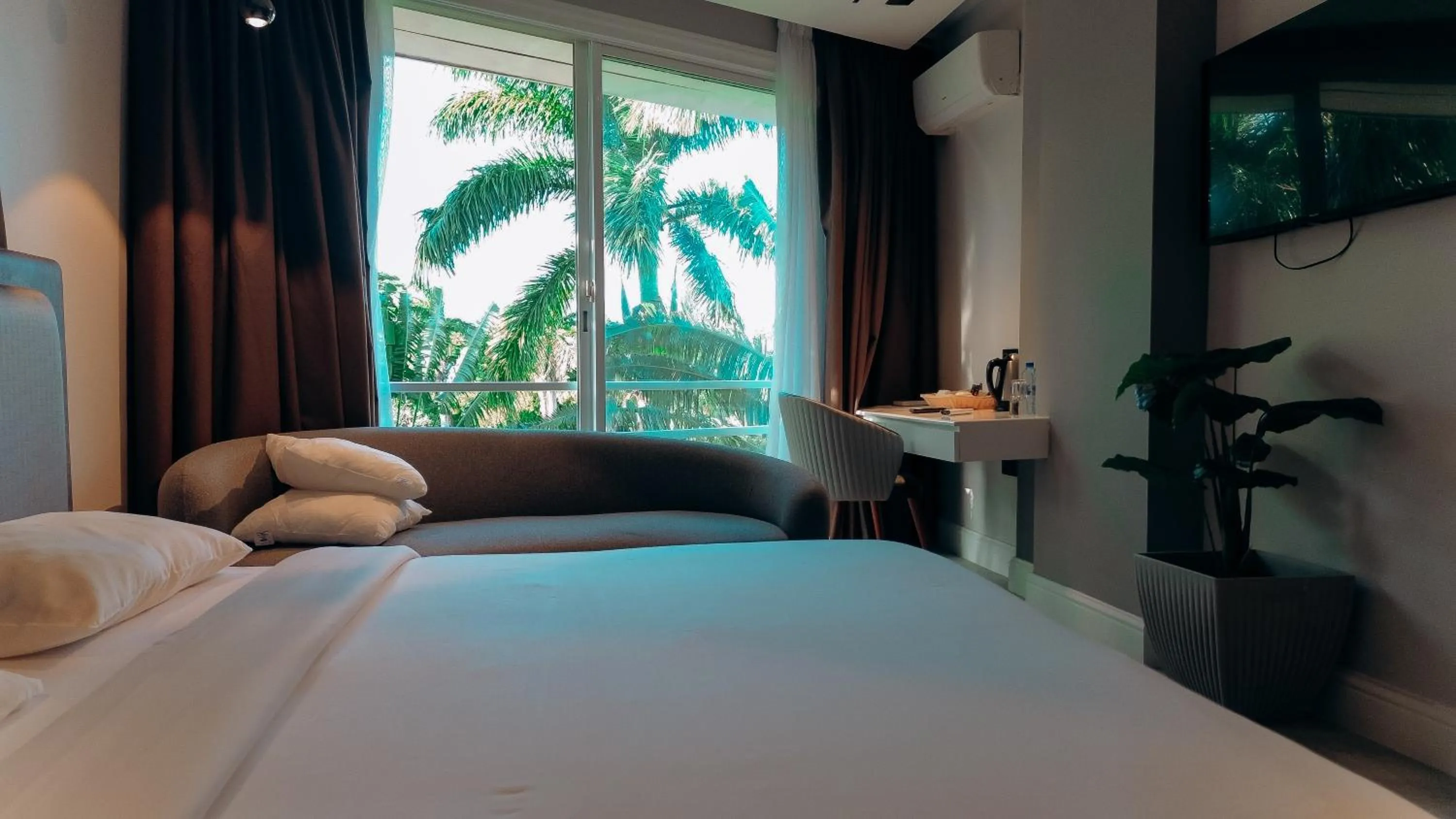 Bed in Tanga Beach Resort & Spa