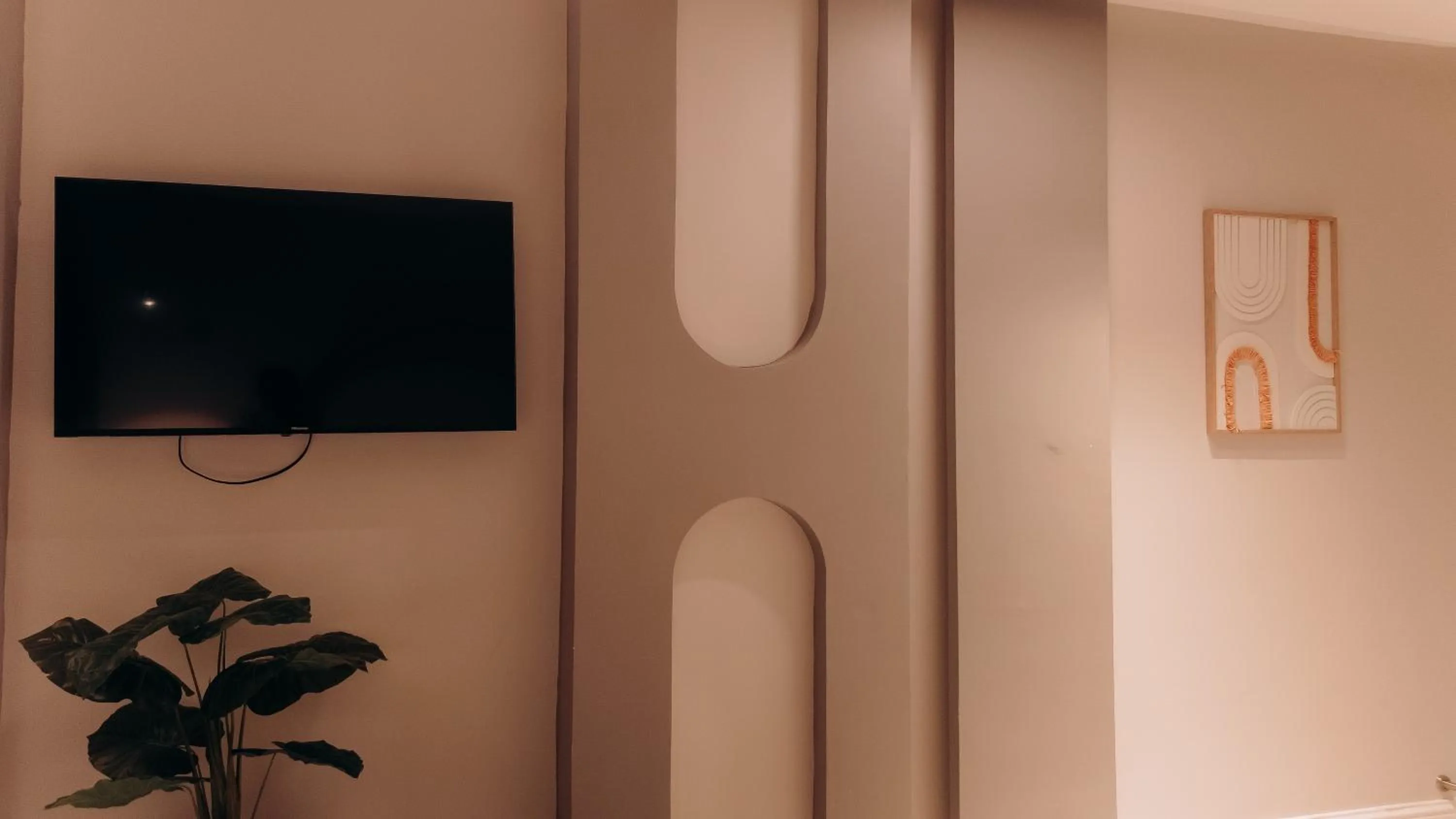 TV and multimedia in Tanga Beach Resort & Spa