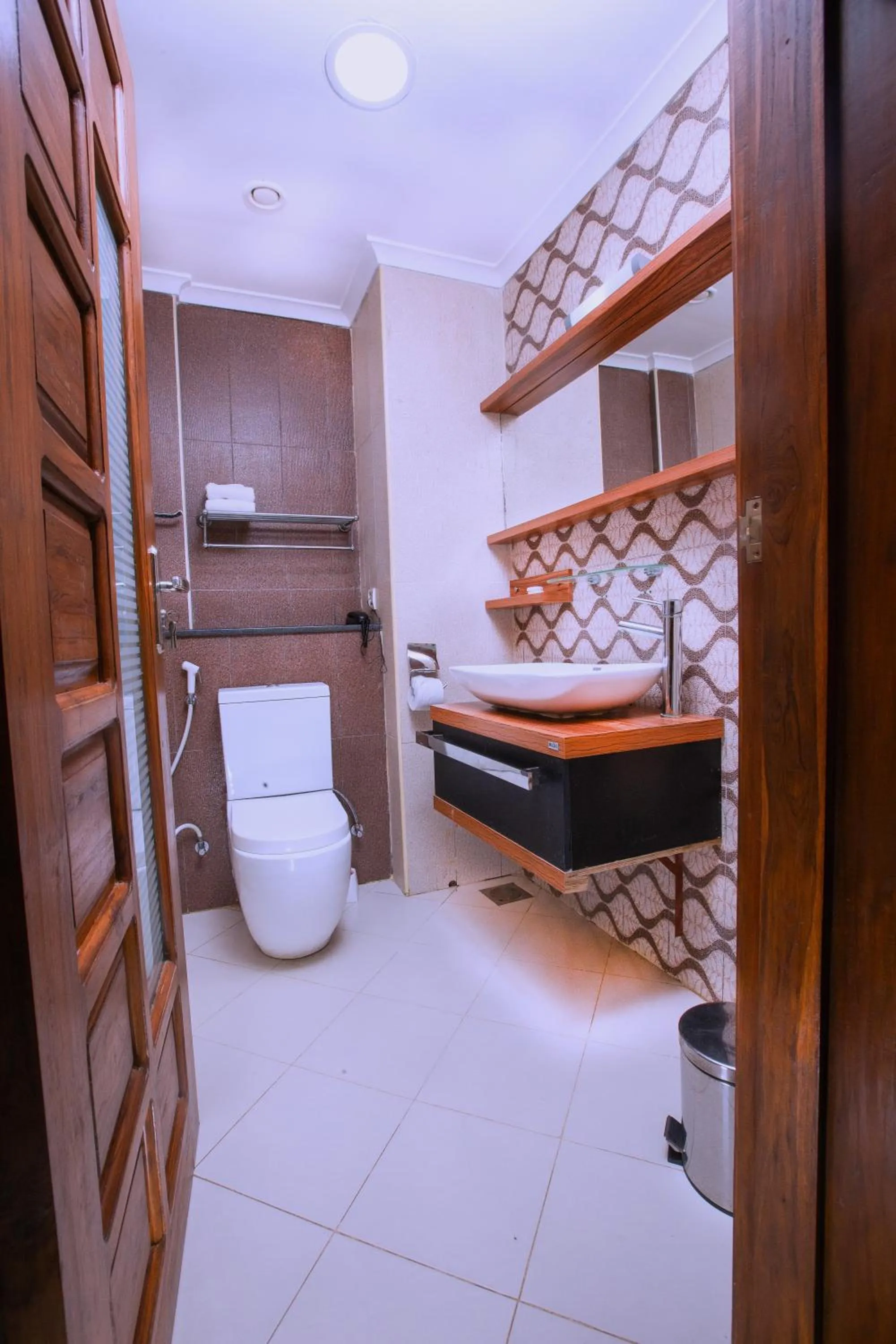 Bathroom in Tanga Beach Resort & Spa
