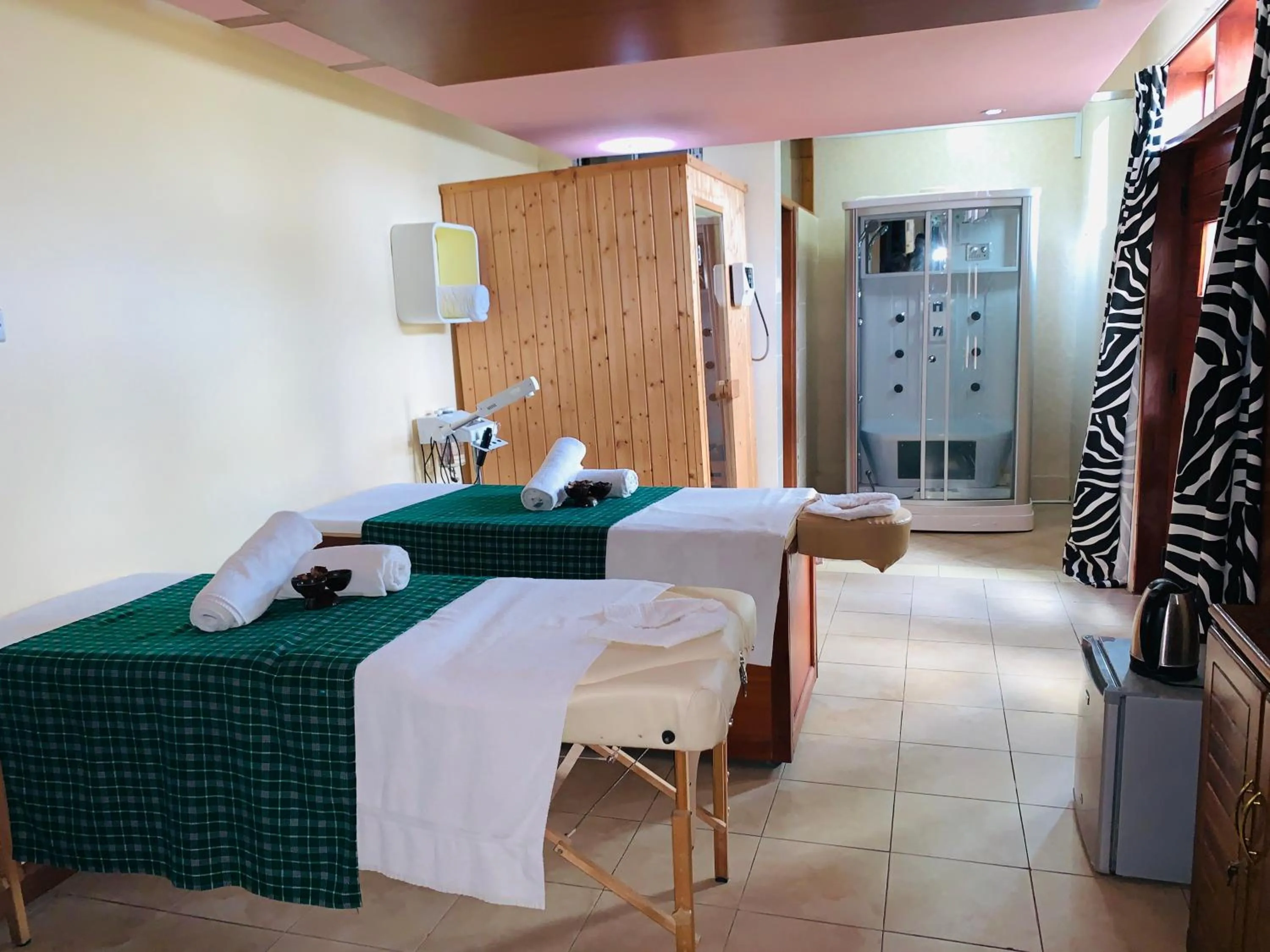 Sauna, Bed in Tanga Beach Resort & Spa