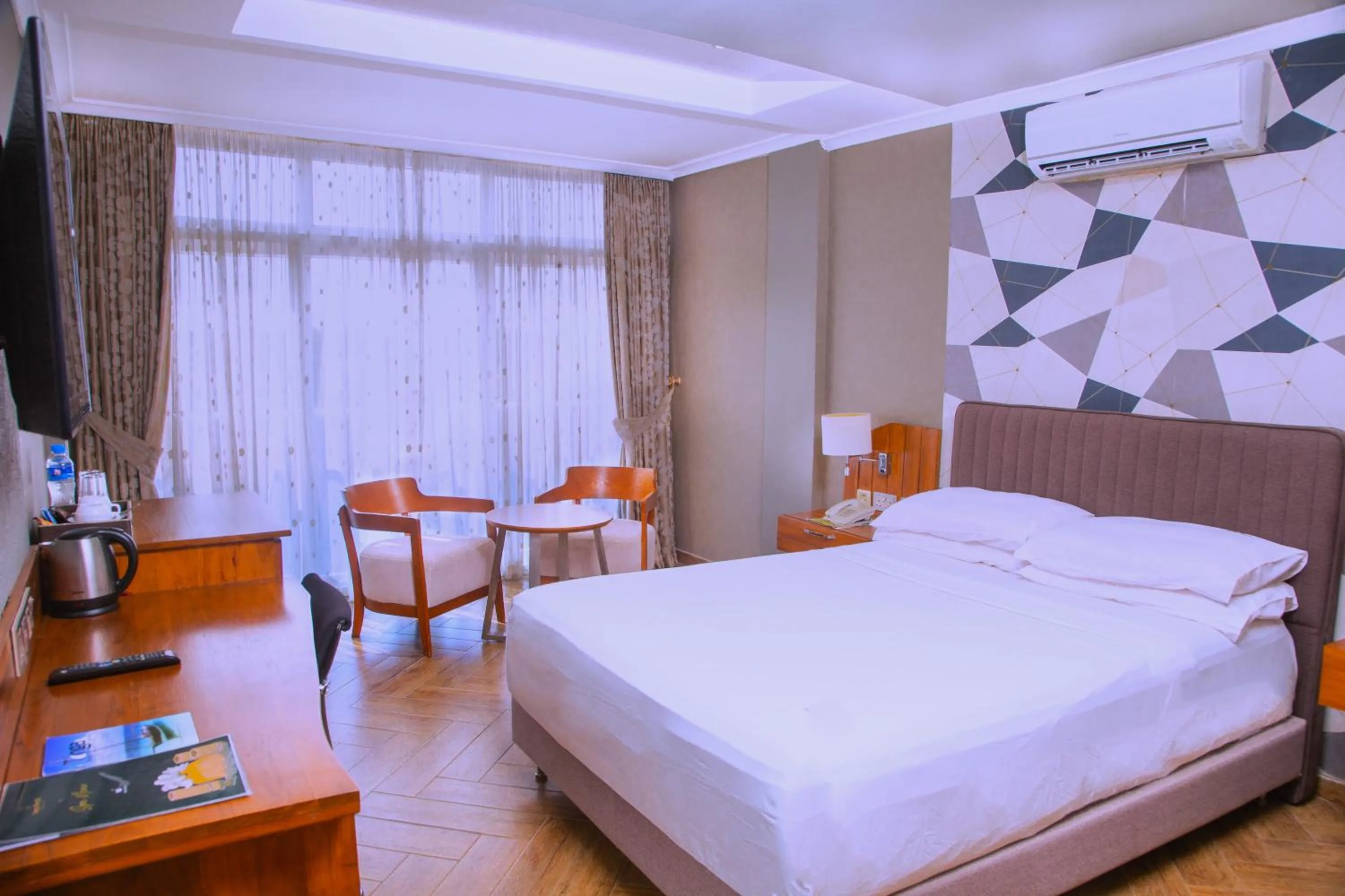 Bed in Tanga Beach Resort & Spa